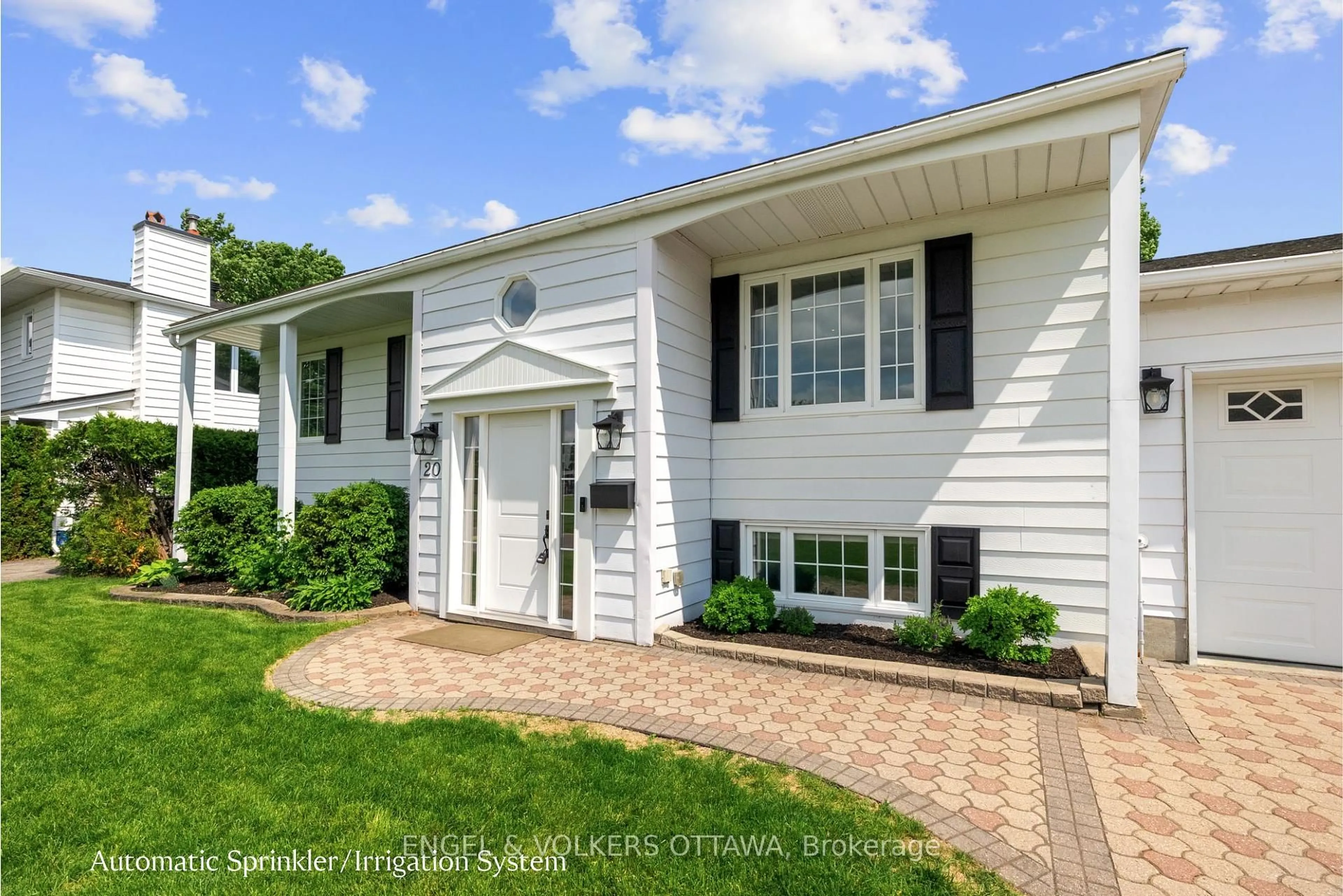 Home with vinyl exterior material, street for 20 Assiniboine Dr, Ottawa Ontario K2E 5R7