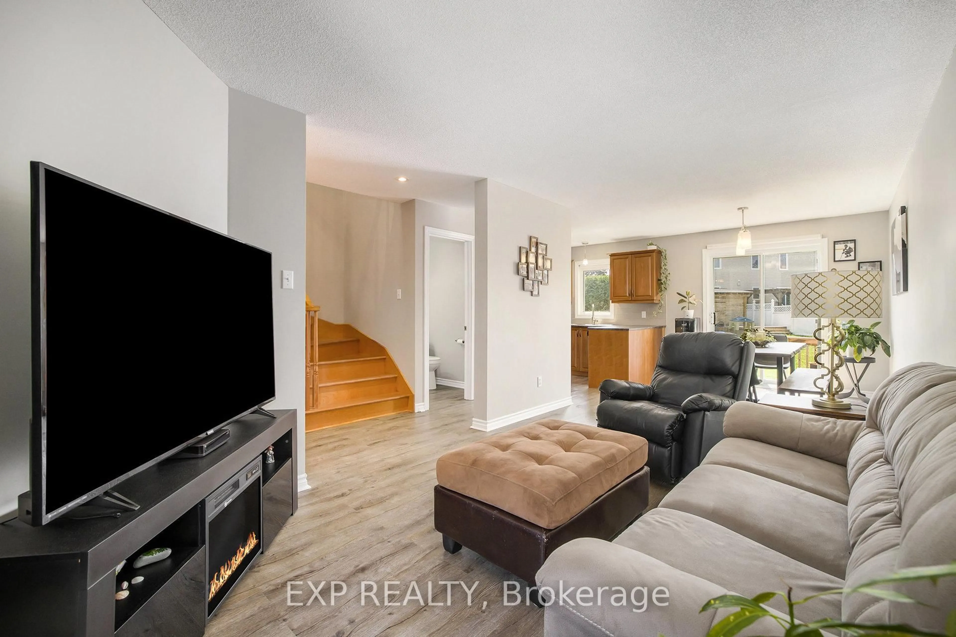 Living room with furniture, wood/laminate floor for 67 Lafleche Blvd, Casselman Ontario K0A 1M0