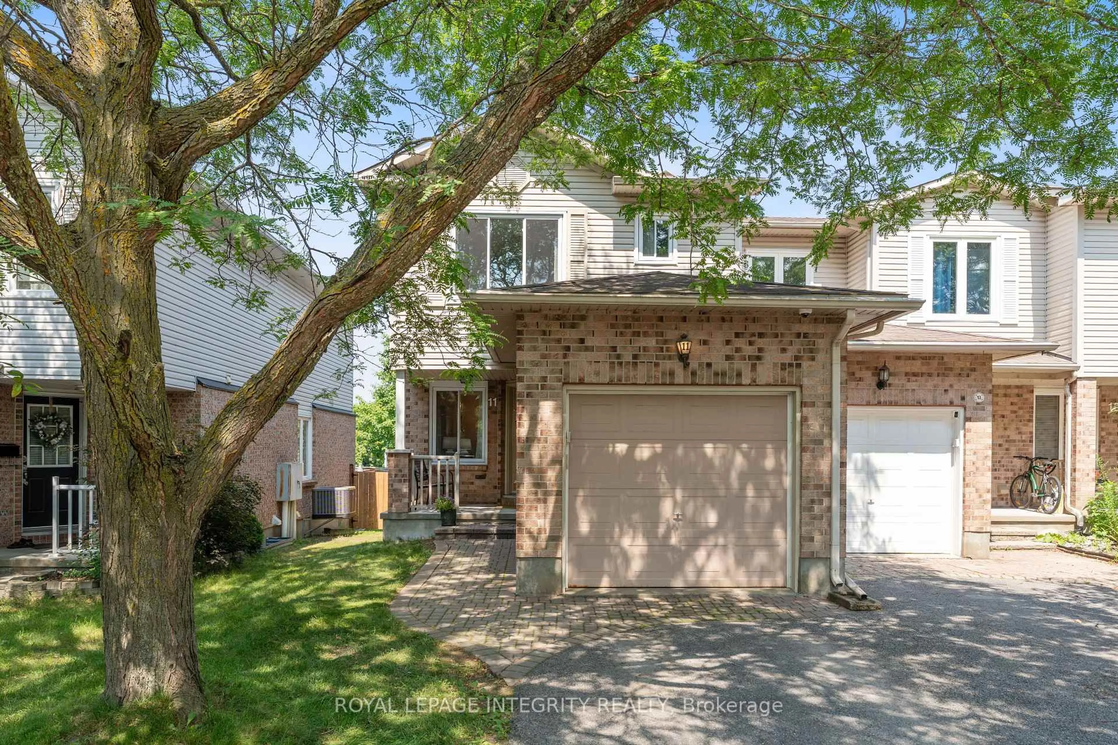 Home with brick exterior material, street for 11 Baton Crt, Kanata Ontario K2L 4C8