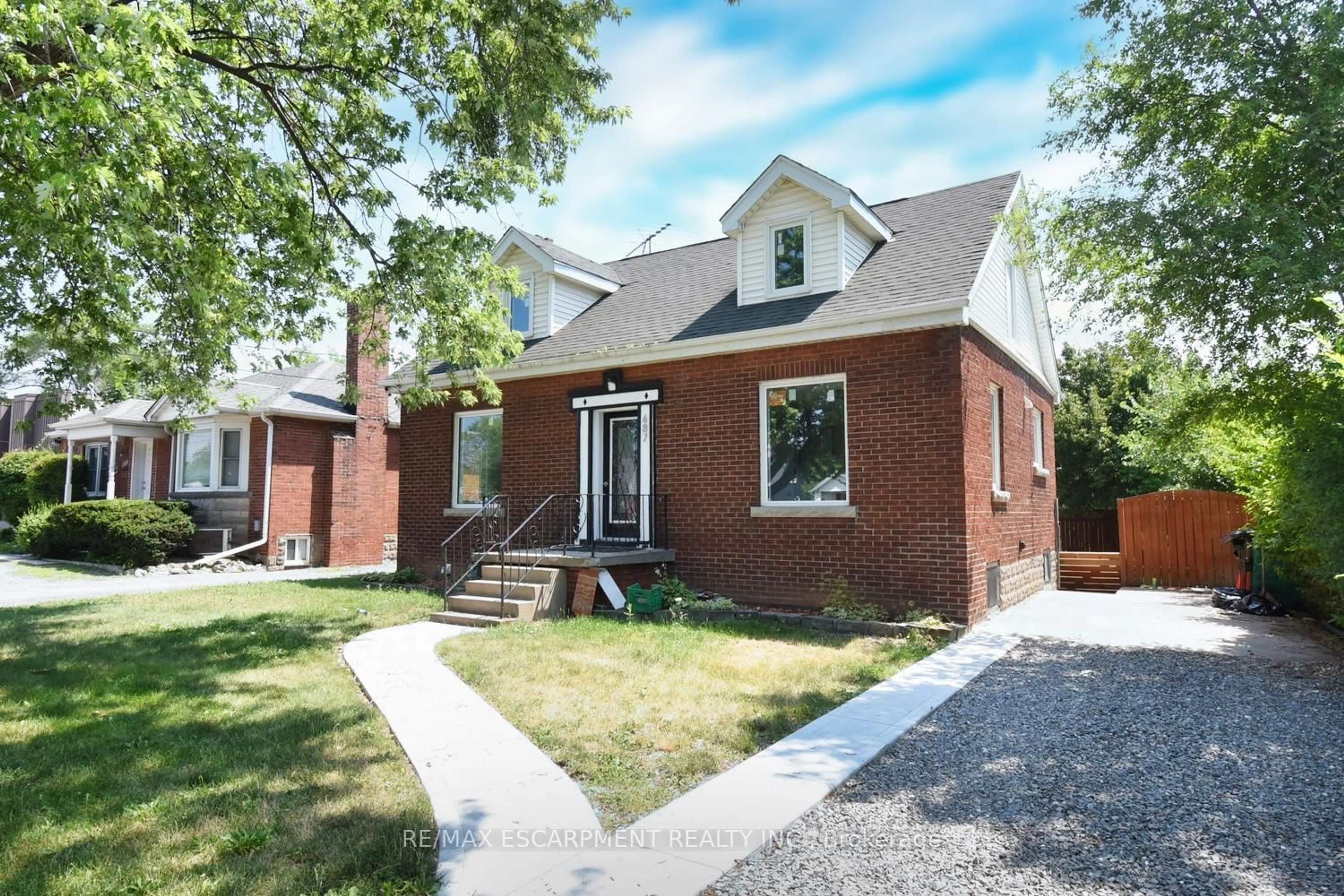 Home with brick exterior material, street for 687 Upper James St, Hamilton Ontario L9C 2Z4