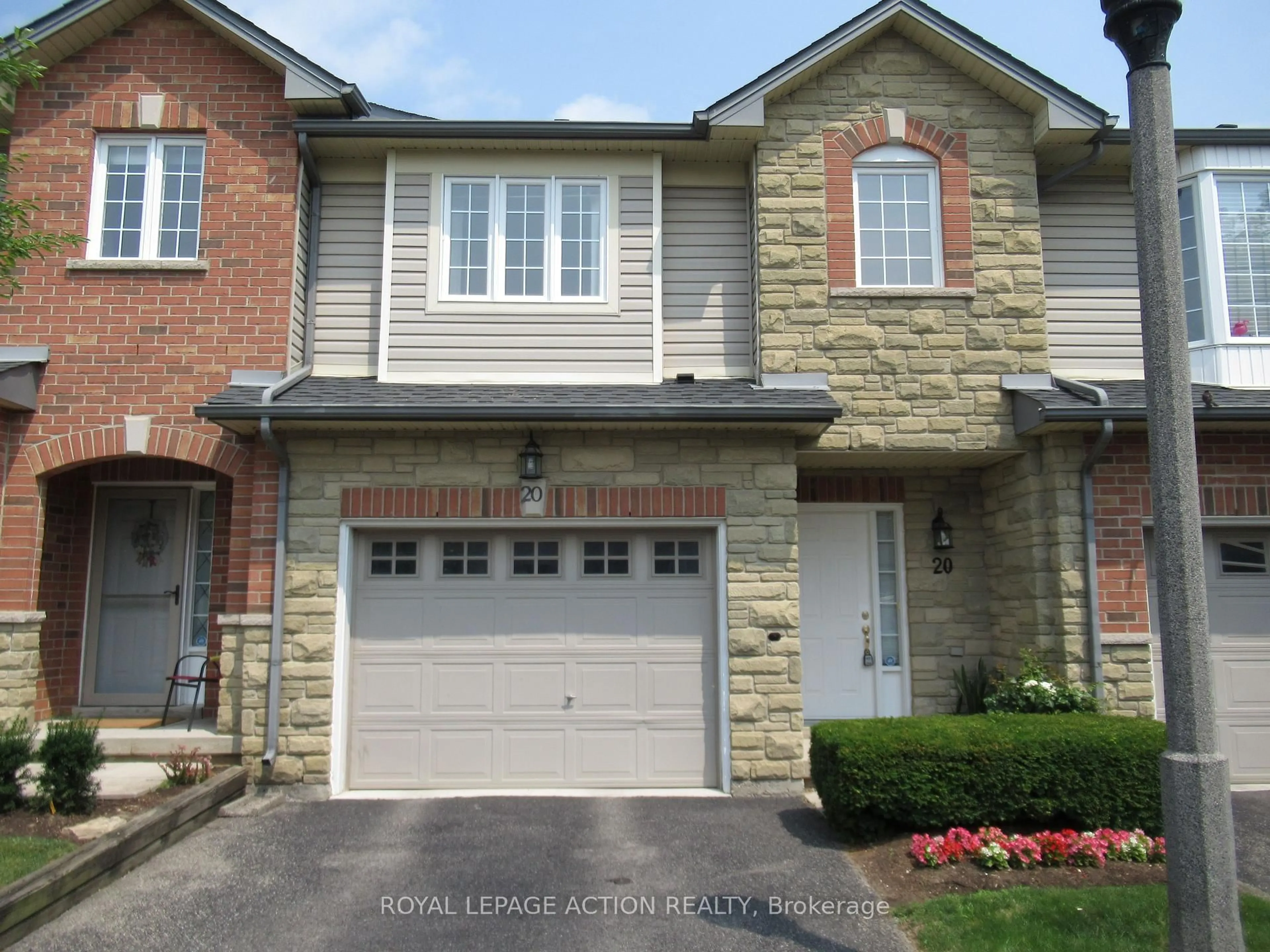 Home with brick exterior material, street for 232 Stonehenge Dr #20, Hamilton Ontario L9K 1R5