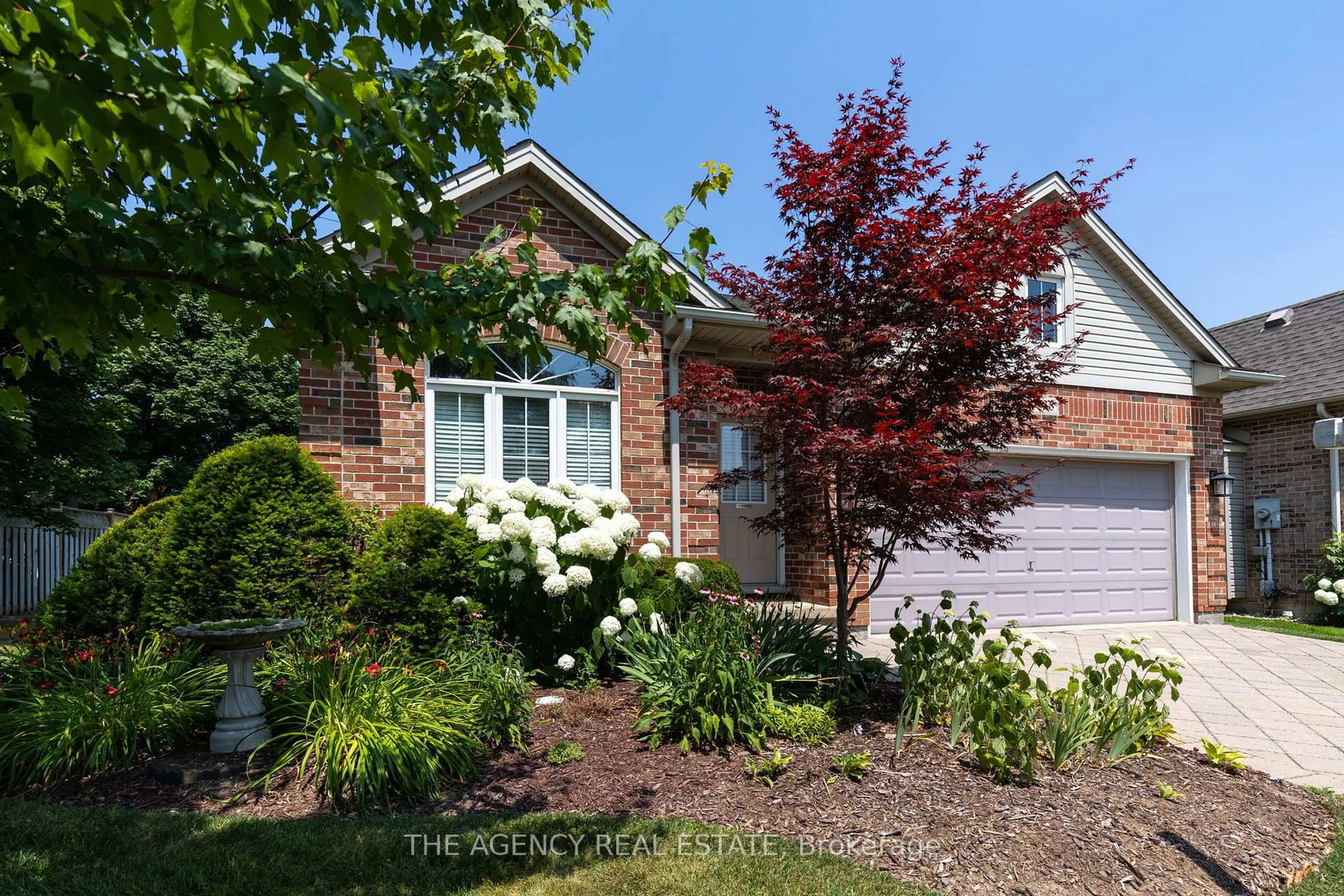 Home with brick exterior material, street for 338 Ambleside Dr, London North Ontario N6G 5H9