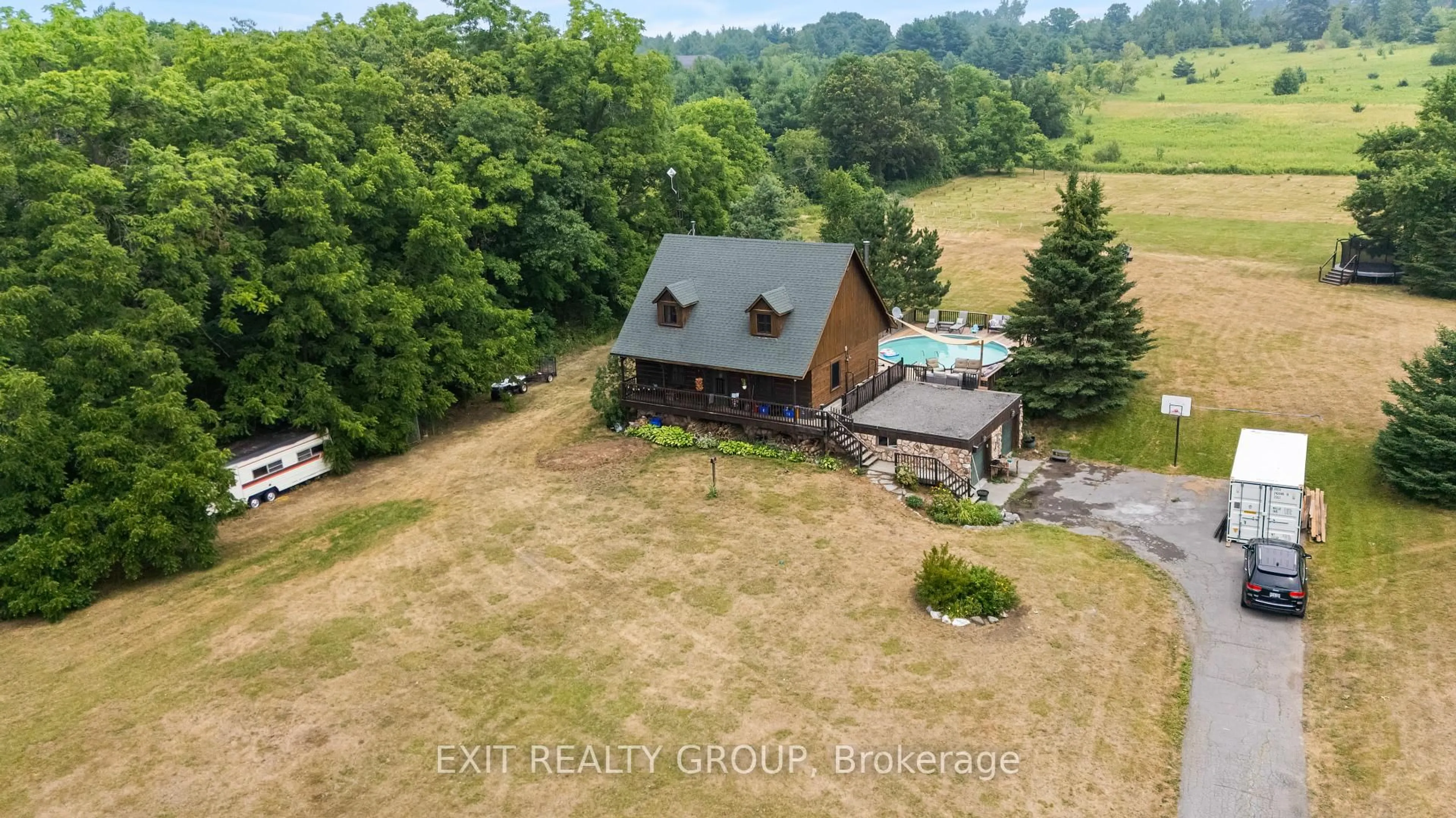A pic from outside/outdoor area/front of a property/back of a property/a pic from drone, unknown for 190 Golf Course Rd, Stirling Ontario K0K 3E0