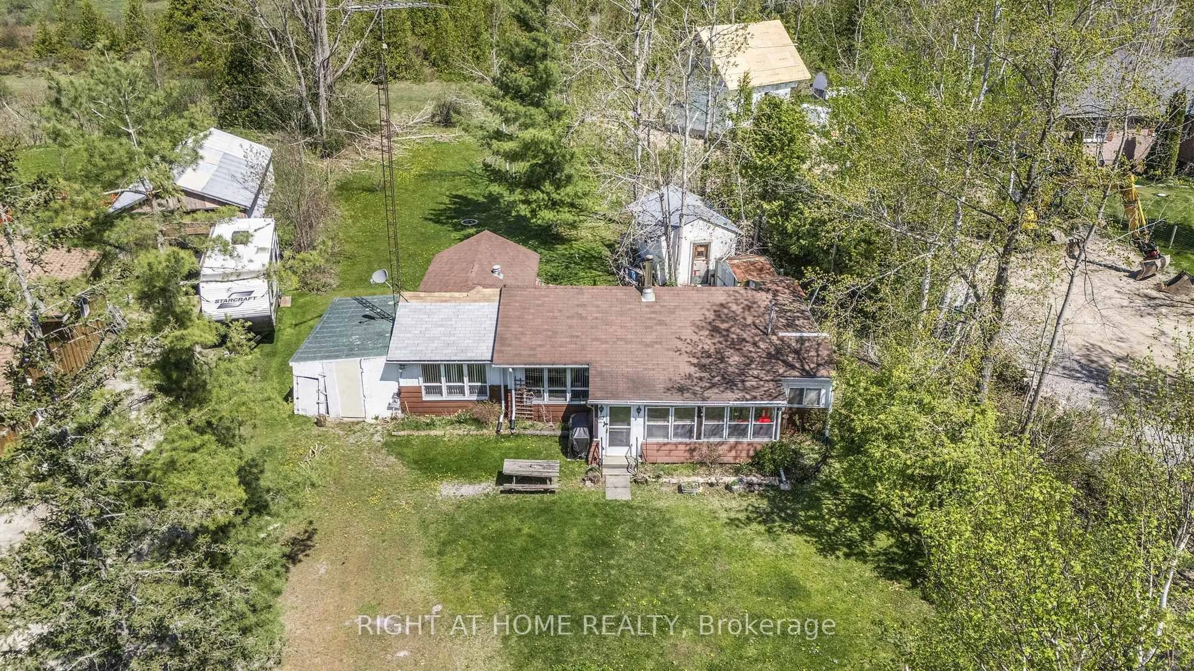 A pic from outside/outdoor area/front of a property/back of a property/a pic from drone, street for 194 Mcguire Beach Rd, Kawartha Lakes Ontario K0M 2B0