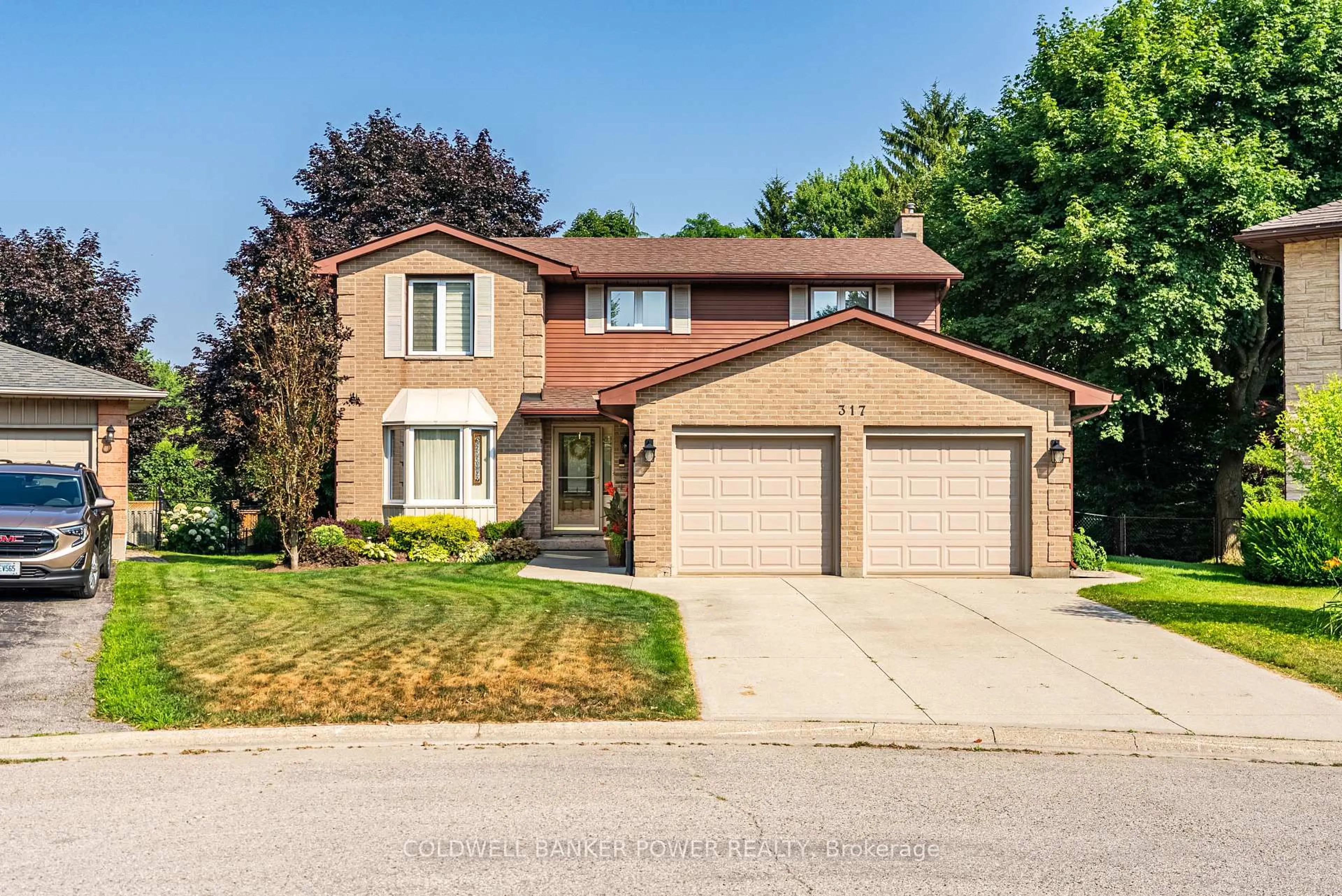 Home with brick exterior material, street for 317 Astoria Crt, London North Ontario N6G 3Z3