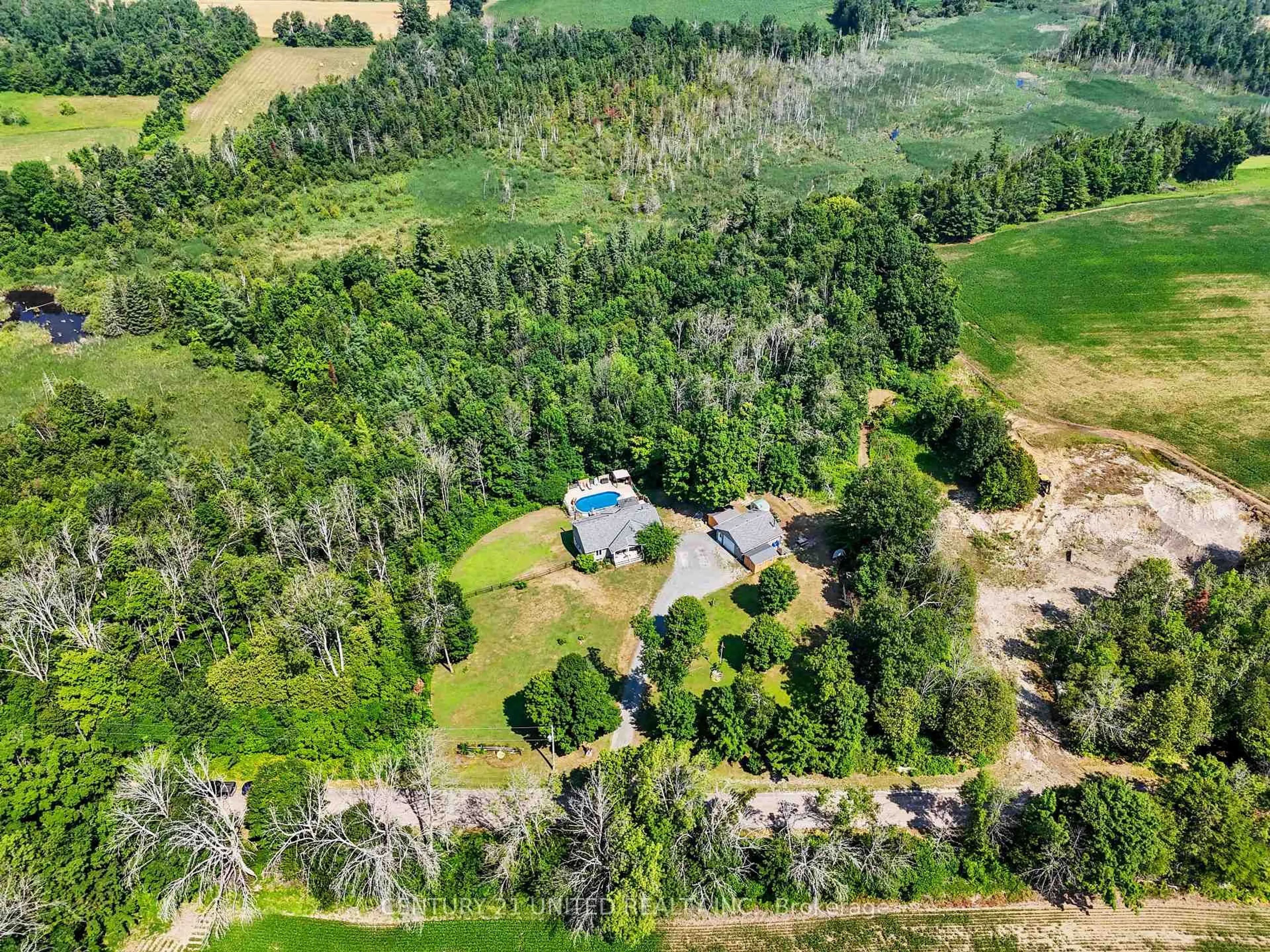 A pic from outside/outdoor area/front of a property/back of a property/a pic from drone, forest/trees view for 390 11th Line West, Trent Hills Ontario K0L 1Y0