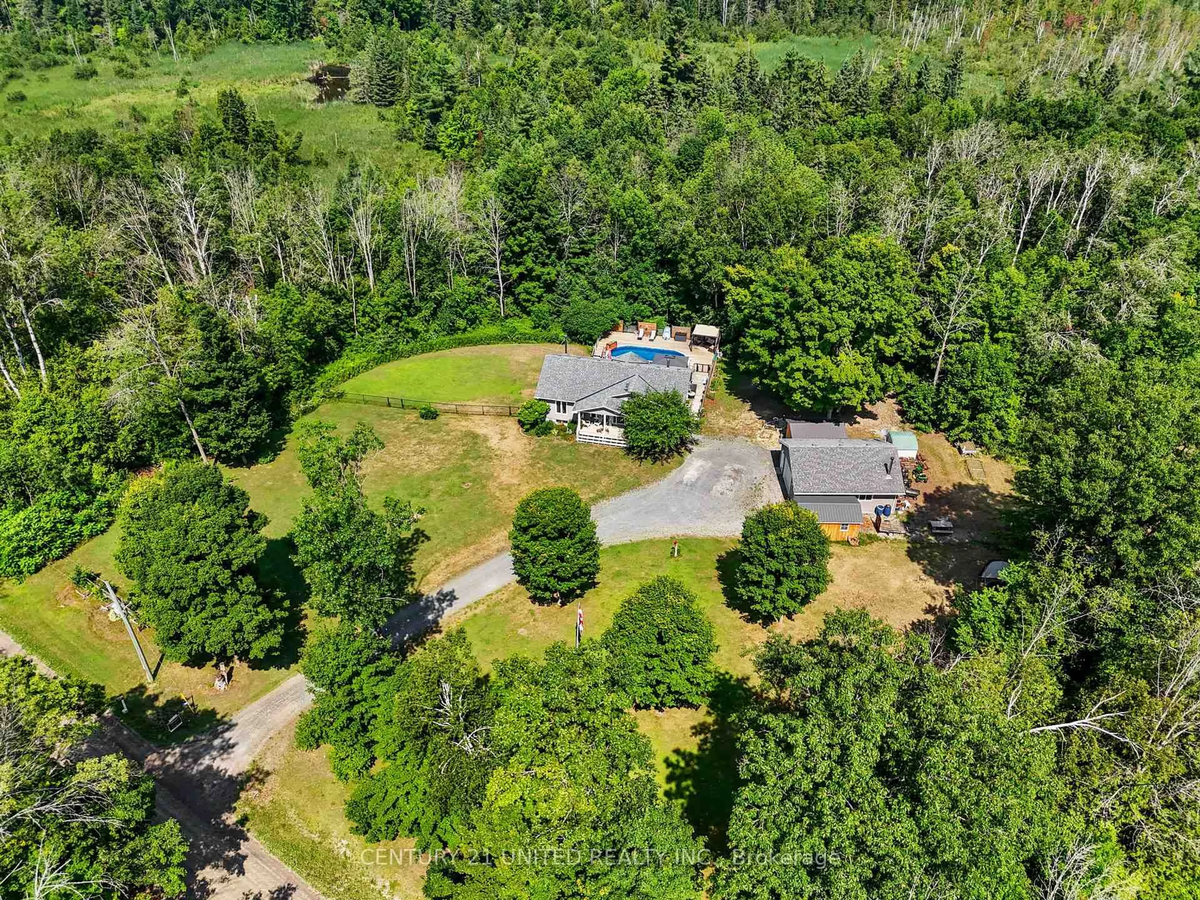 A pic from outside/outdoor area/front of a property/back of a property/a pic from drone, forest/trees view for 390 11th Line West, Trent Hills Ontario K0L 1Y0