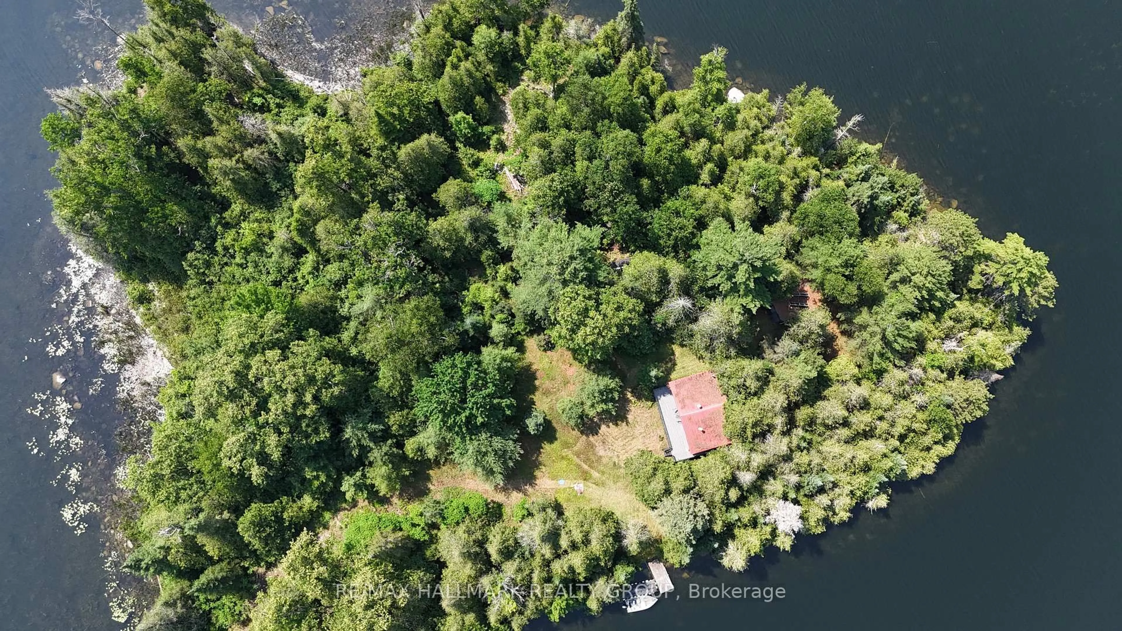 A pic from outside/outdoor area/front of a property/back of a property/a pic from drone, water/lake/river/ocean view for 900 Brendan's Island, White Lake Ontario K0A 3L0
