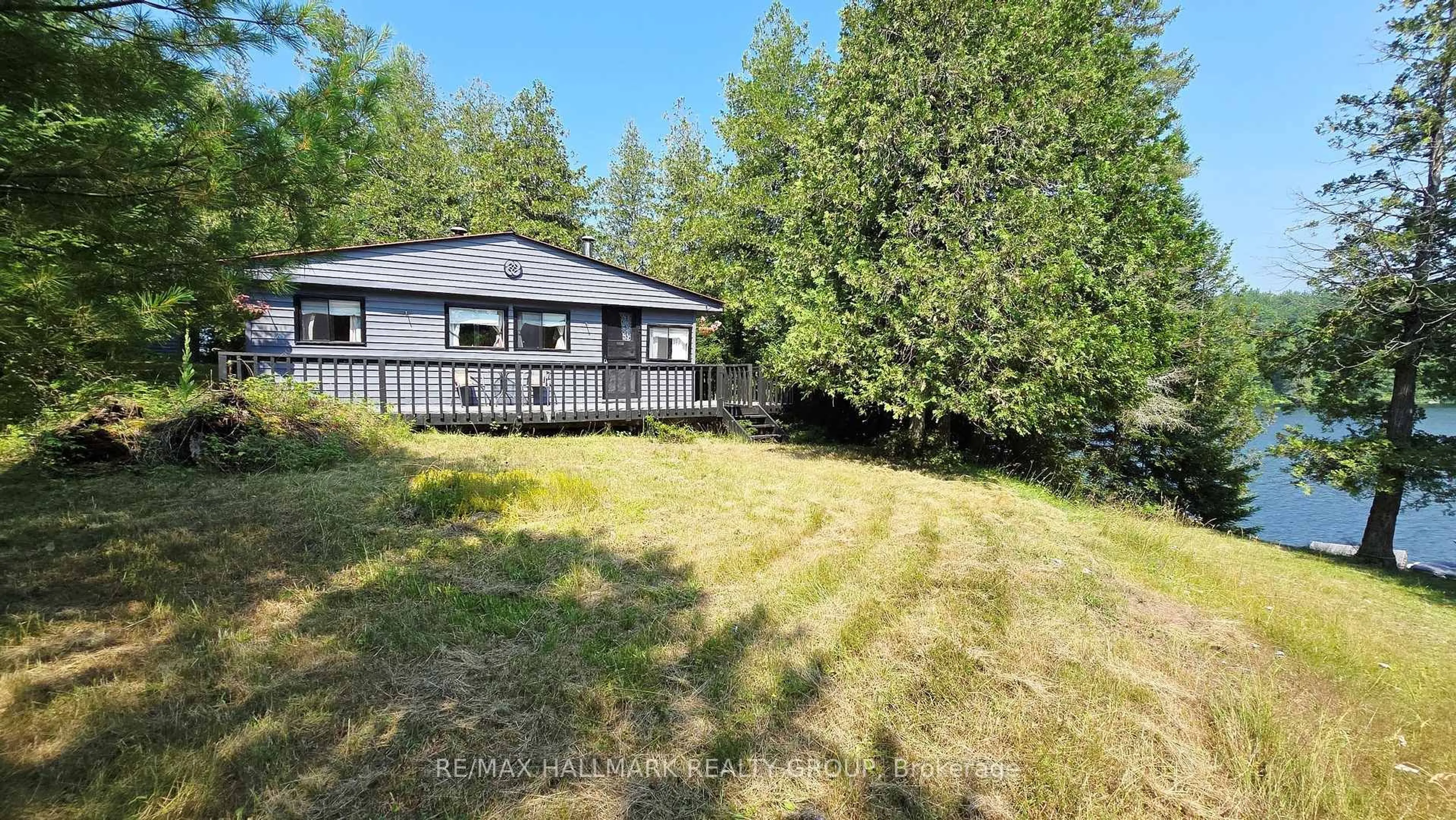 A pic from outside/outdoor area/front of a property/back of a property/a pic from drone, unknown for 900 Brendan's Island, White Lake Ontario K0A 3L0