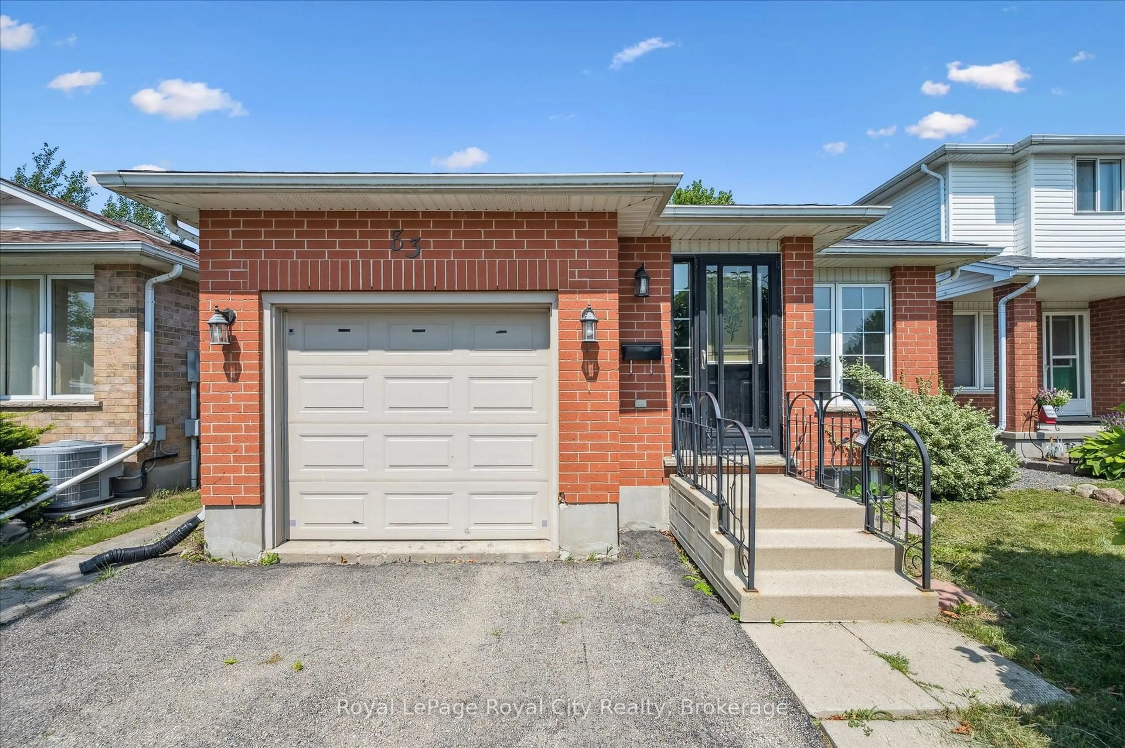 Home with brick exterior material, street for 83 Inverness Dr, Guelph Ontario N1E 6E4