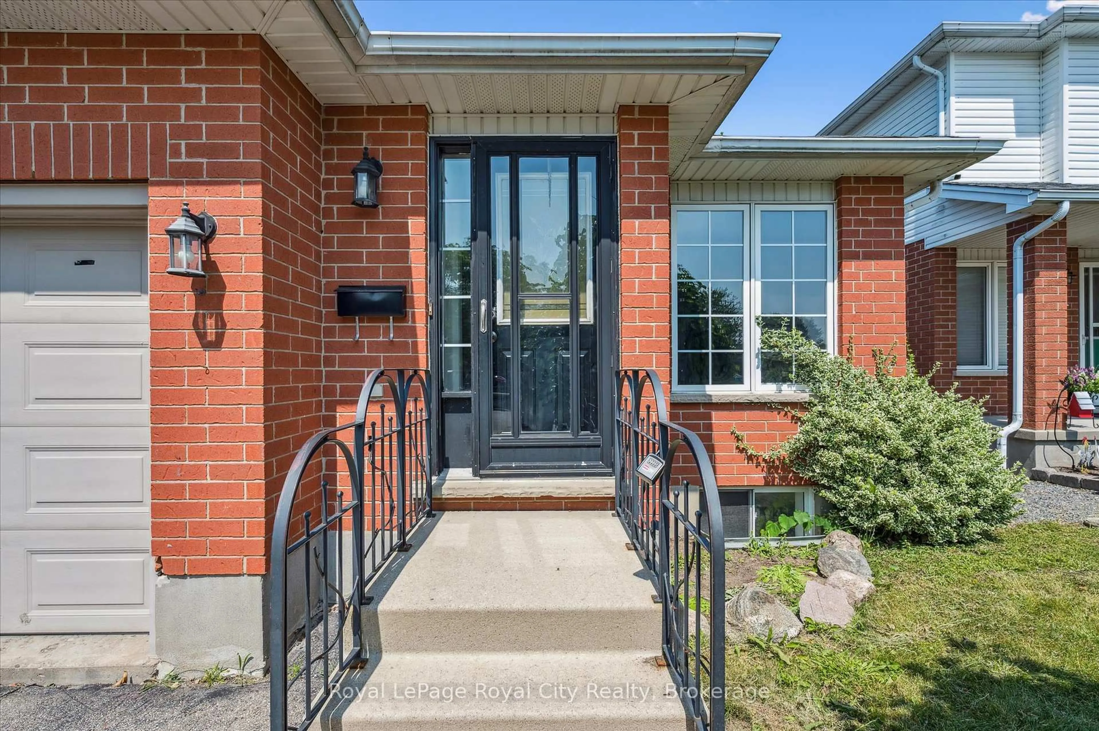 Home with brick exterior material, street for 83 Inverness Dr, Guelph Ontario N1E 6E4