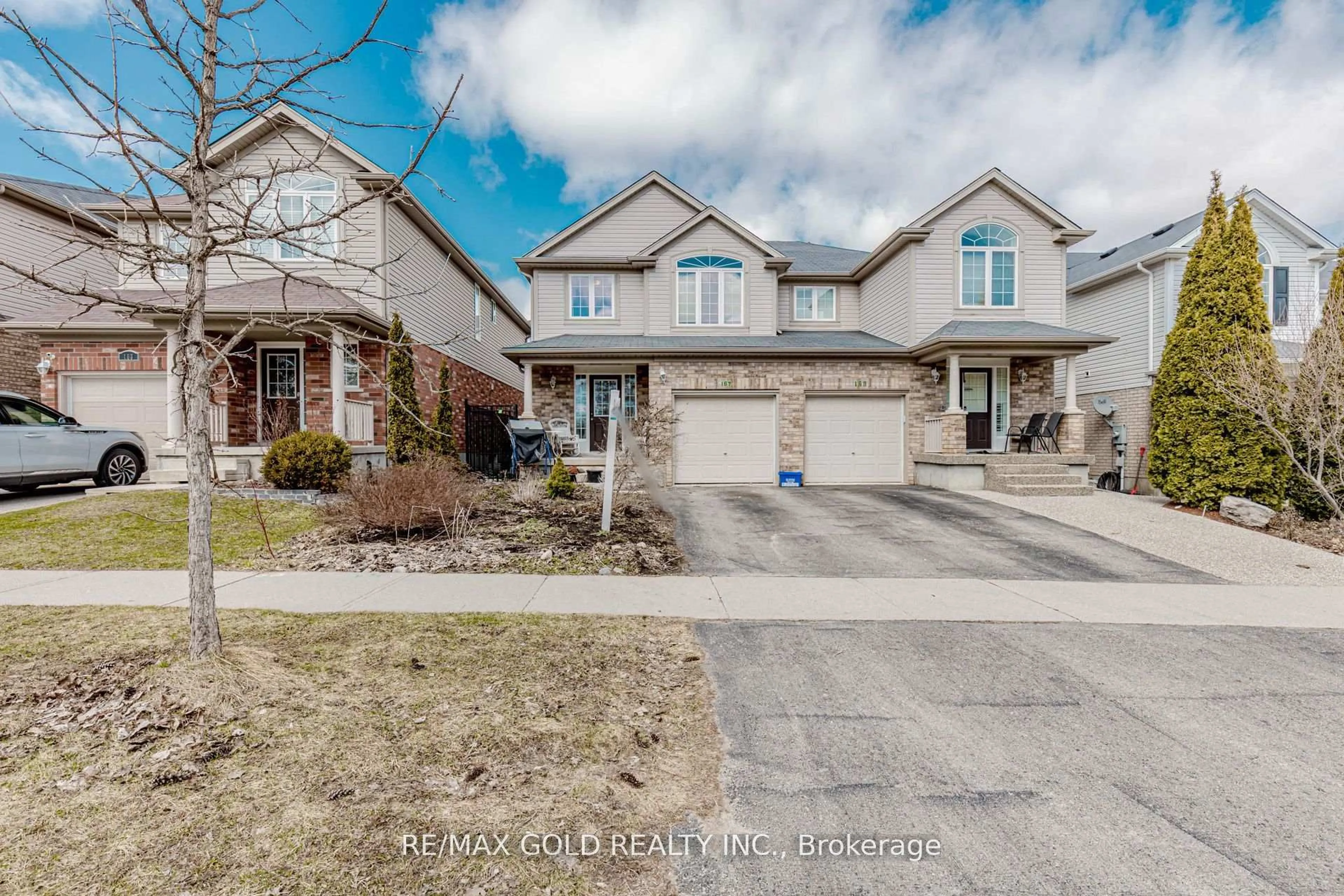 Home with brick exterior material, street for 167 Sims Estate Dr, Kitchener Ontario N2A 0A6