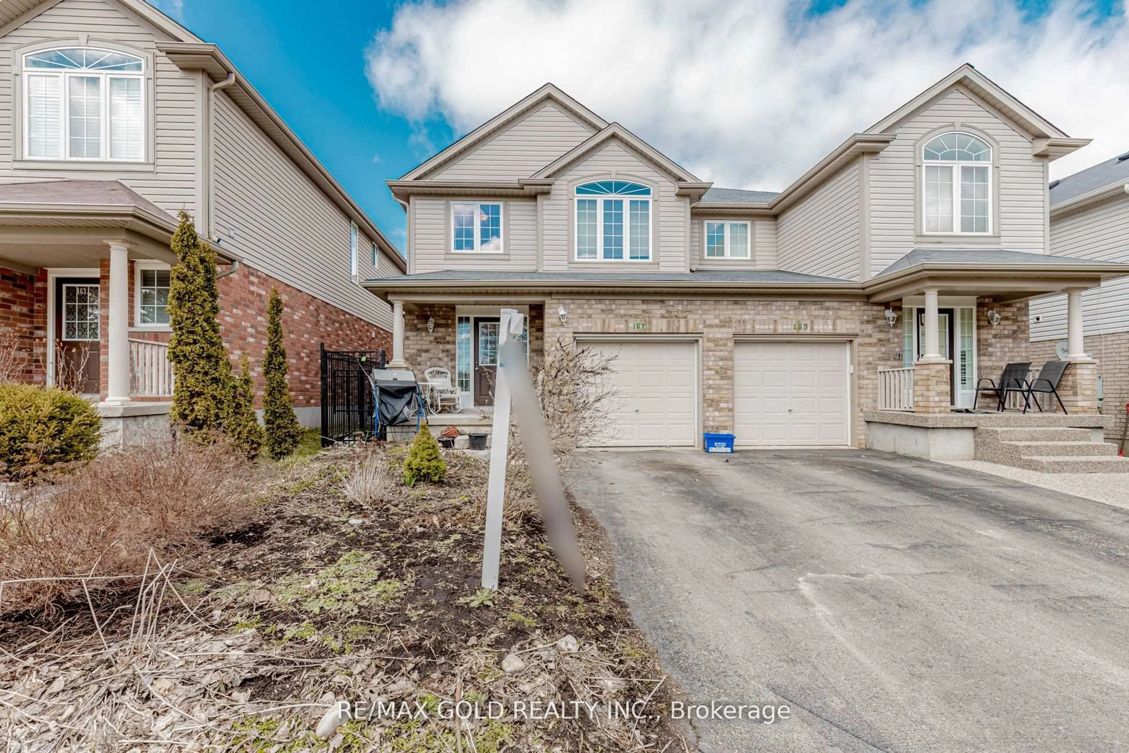 Home with brick exterior material, street for 167 Sims Estate Dr, Kitchener Ontario N2A 0A6