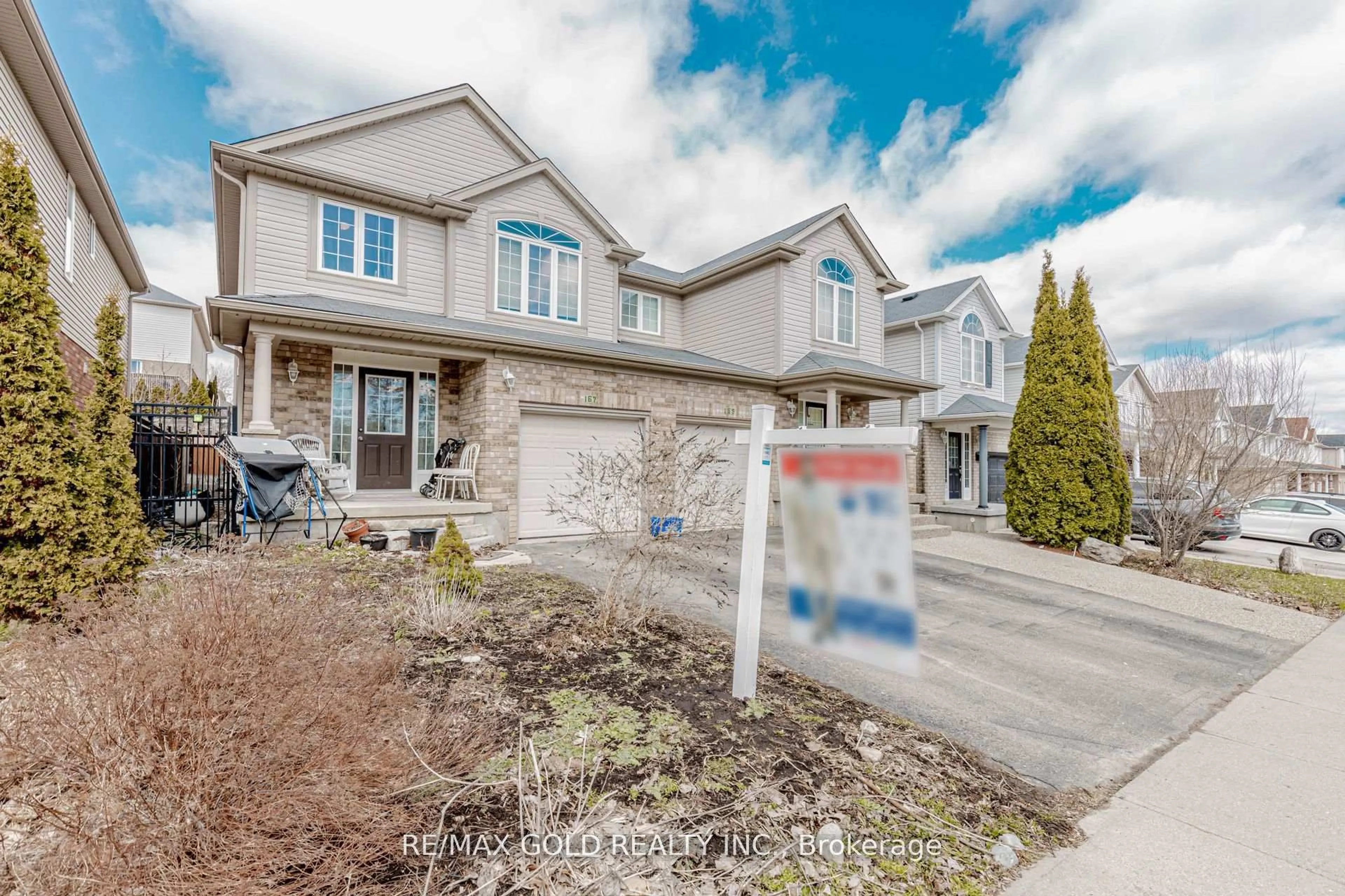 Home with brick exterior material, street for 167 Sims Estate Dr, Kitchener Ontario N2A 0A6