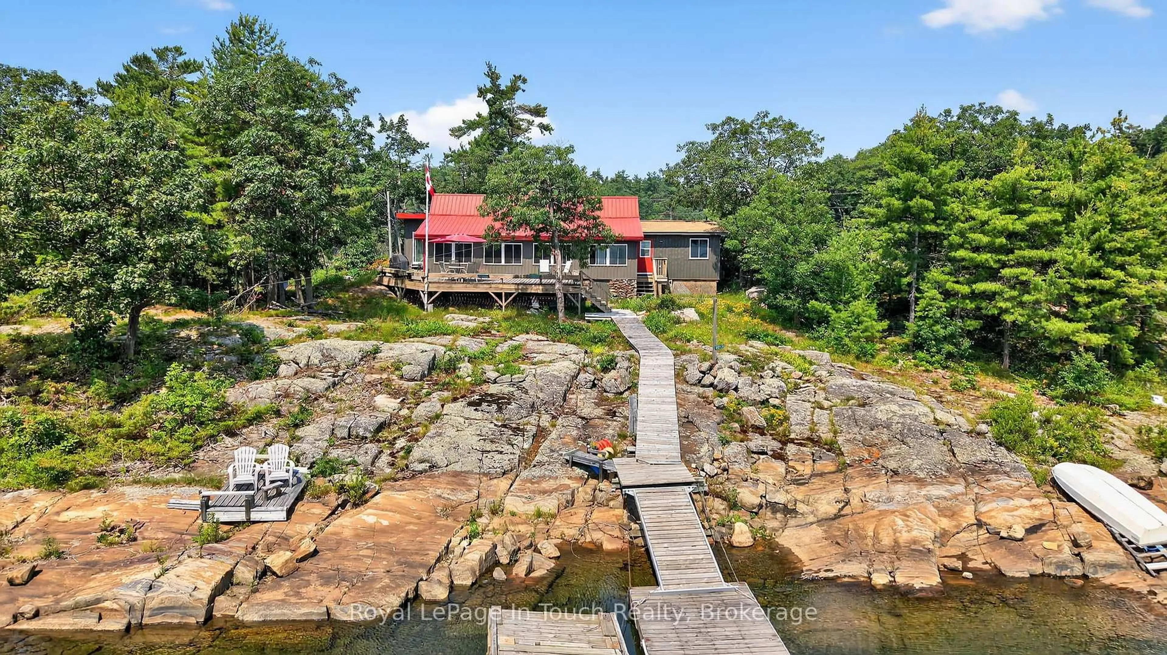 A pic from outside/outdoor area/front of a property/back of a property/a pic from drone, water/lake/river/ocean view for 34 B320 Sans Souci Island, The Archipelago Ontario P0C 1H0