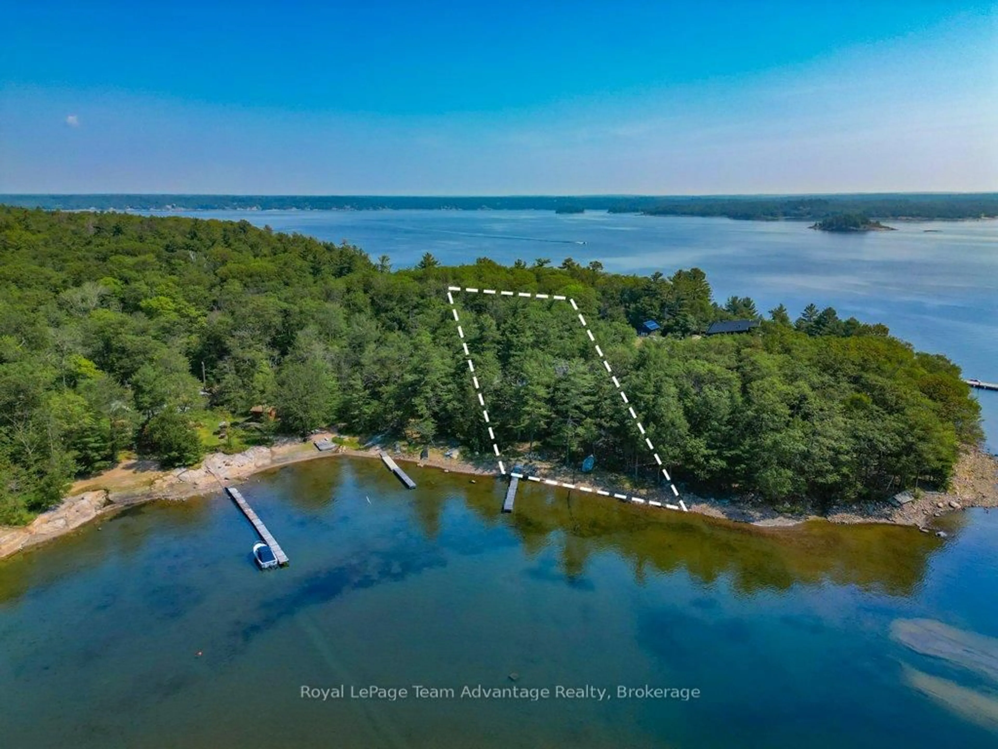 A pic from outside/outdoor area/front of a property/back of a property/a pic from drone, water/lake/river/ocean view for 46 Huckleberry 15C Island, Carling Ontario P0G 1G0