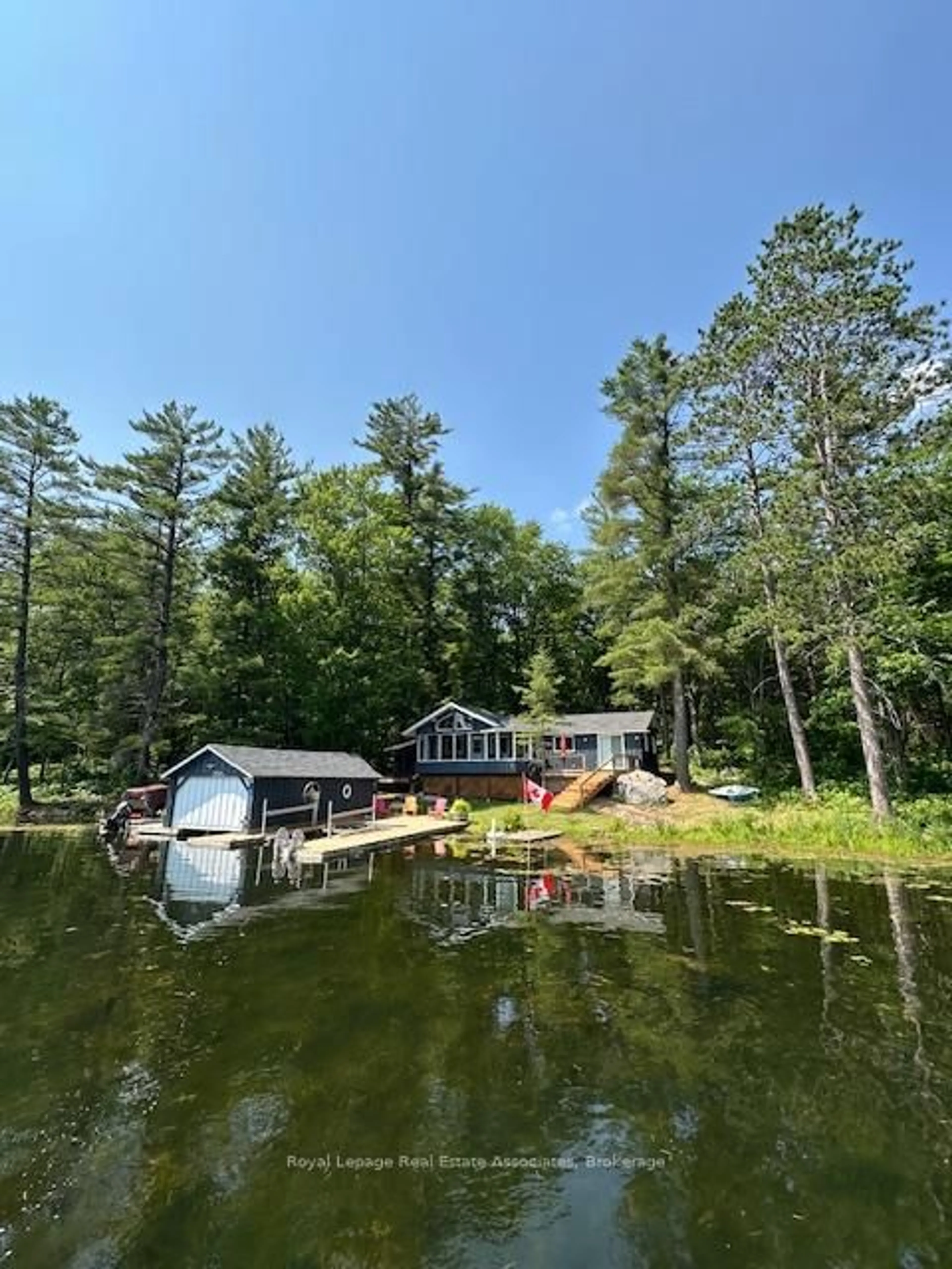 A pic from outside/outdoor area/front of a property/back of a property/a pic from drone, water/lake/river/ocean view for 7206 Severn River Shore, Georgian Bay Ontario P0C 1M0