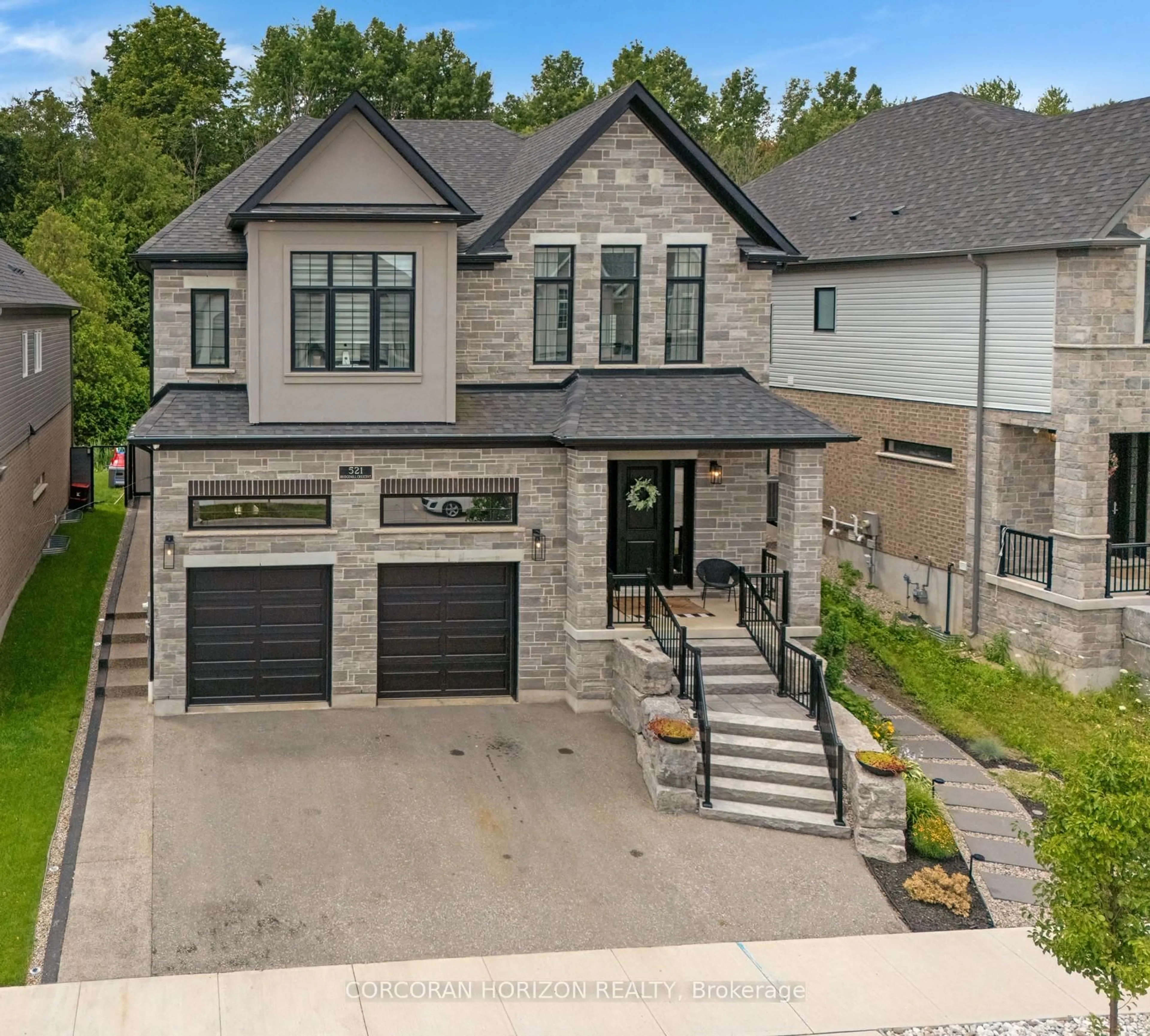 Home with brick exterior material, street for 521 Bridgemill Cres, Kitchener Ontario N2A 0C7