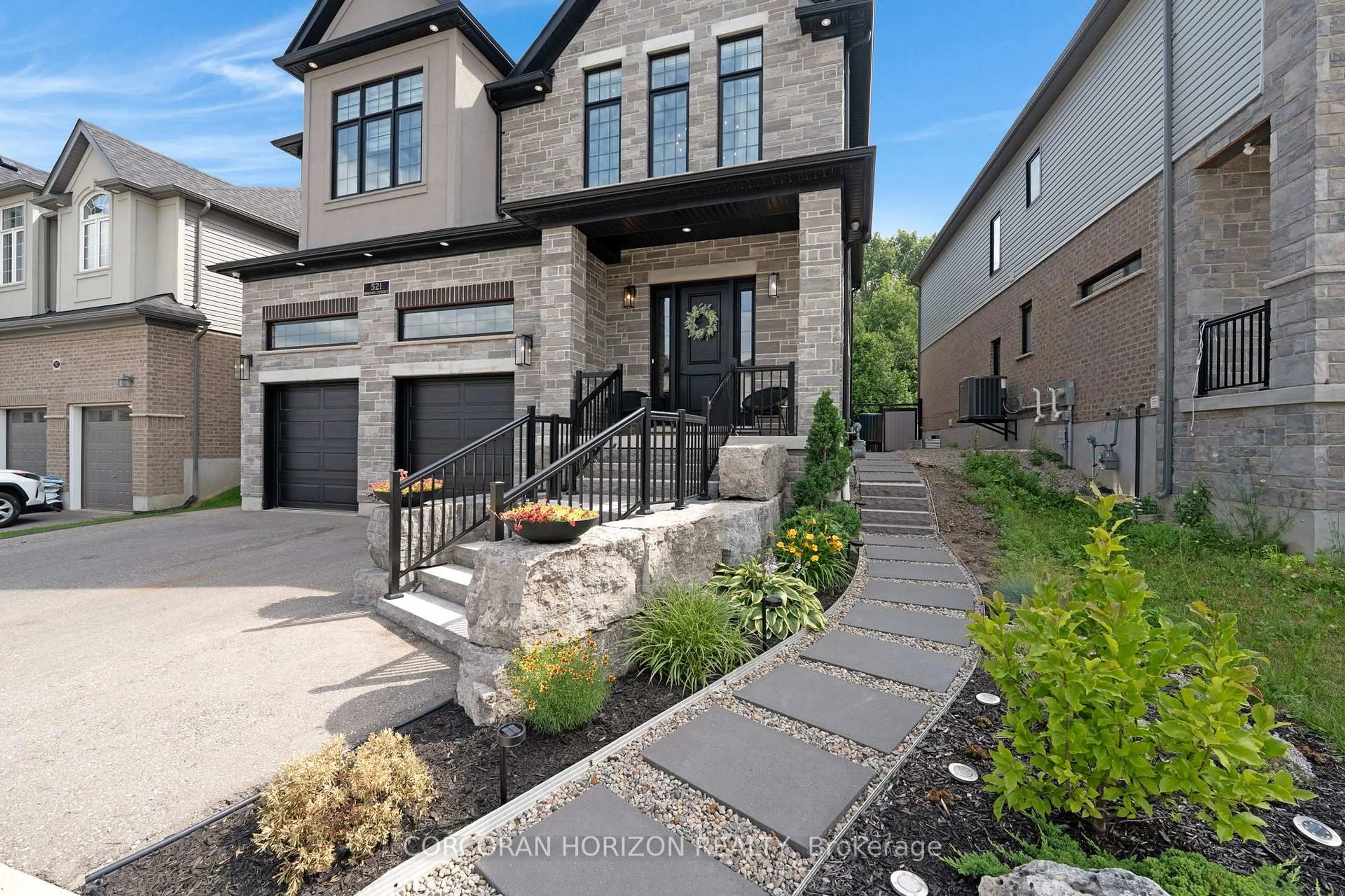 Home with brick exterior material, street for 521 Bridgemill Cres, Kitchener Ontario N2A 0C7