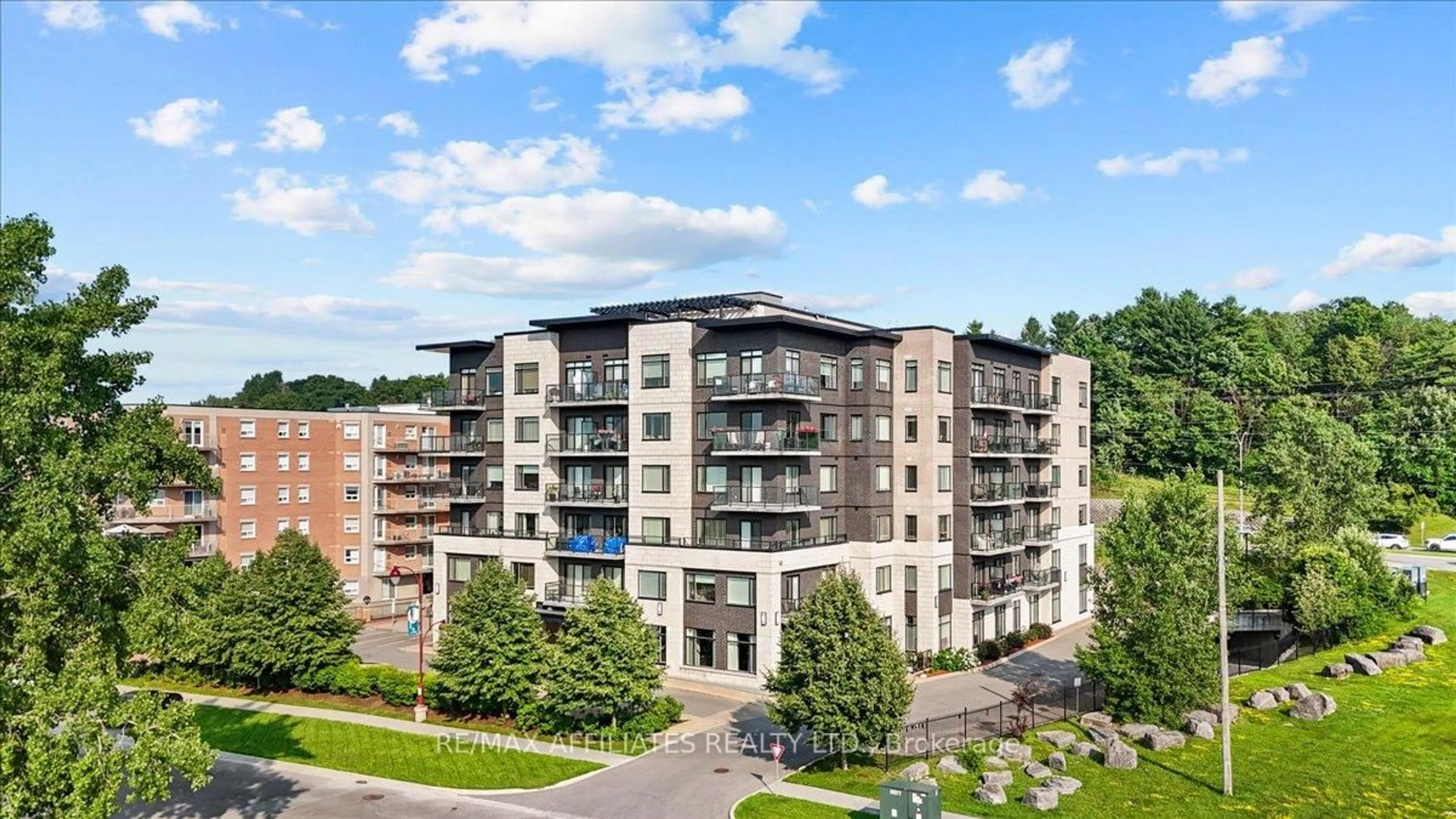 A pic from outside/outdoor area/front of a property/back of a property/a pic from drone, unknown for 310 Centrum Blvd #606, Ottawa Ontario K1E 0A3