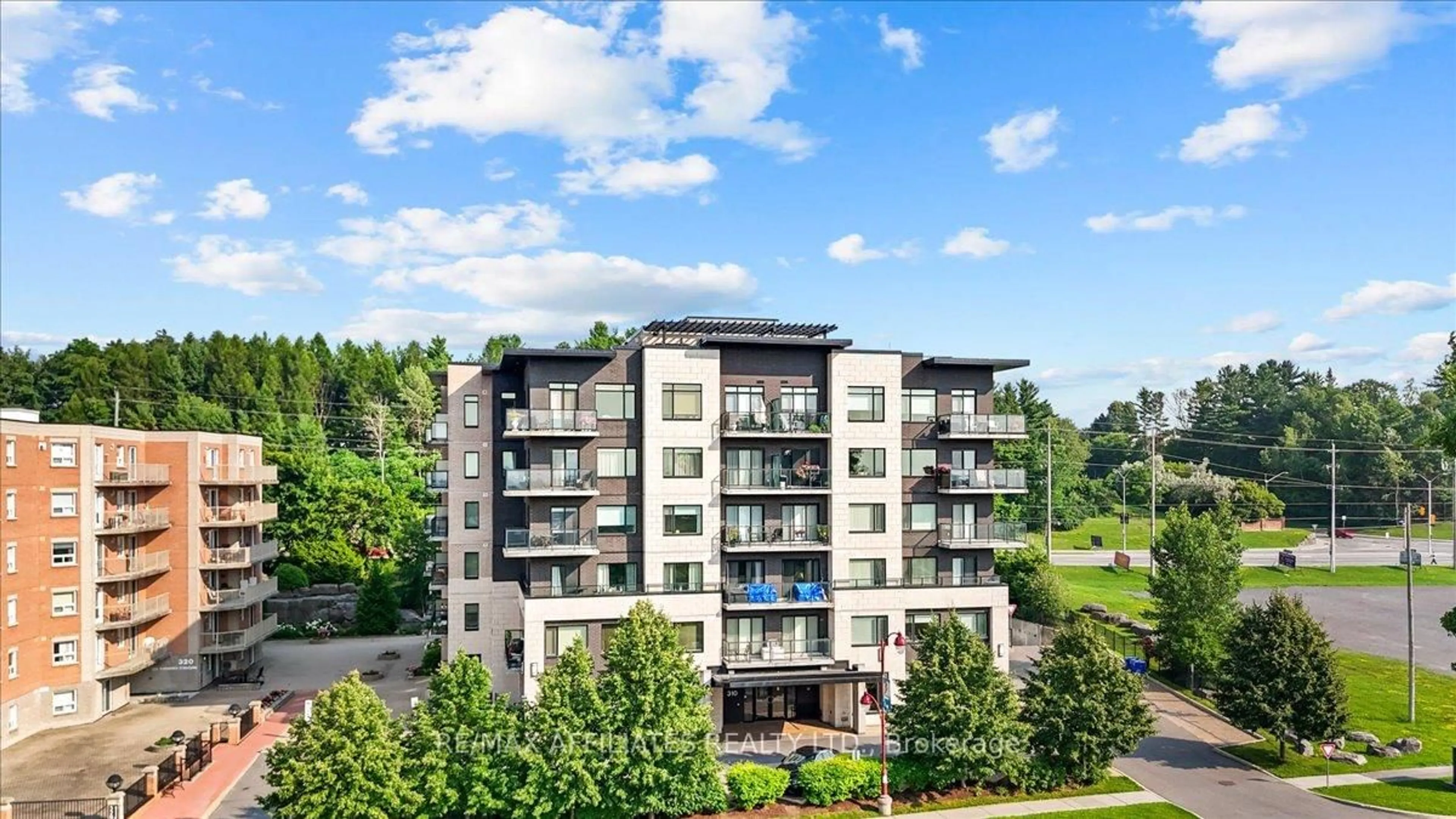 A pic from outside/outdoor area/front of a property/back of a property/a pic from drone, unknown for 310 Centrum Blvd #606, Ottawa Ontario K1E 0A3