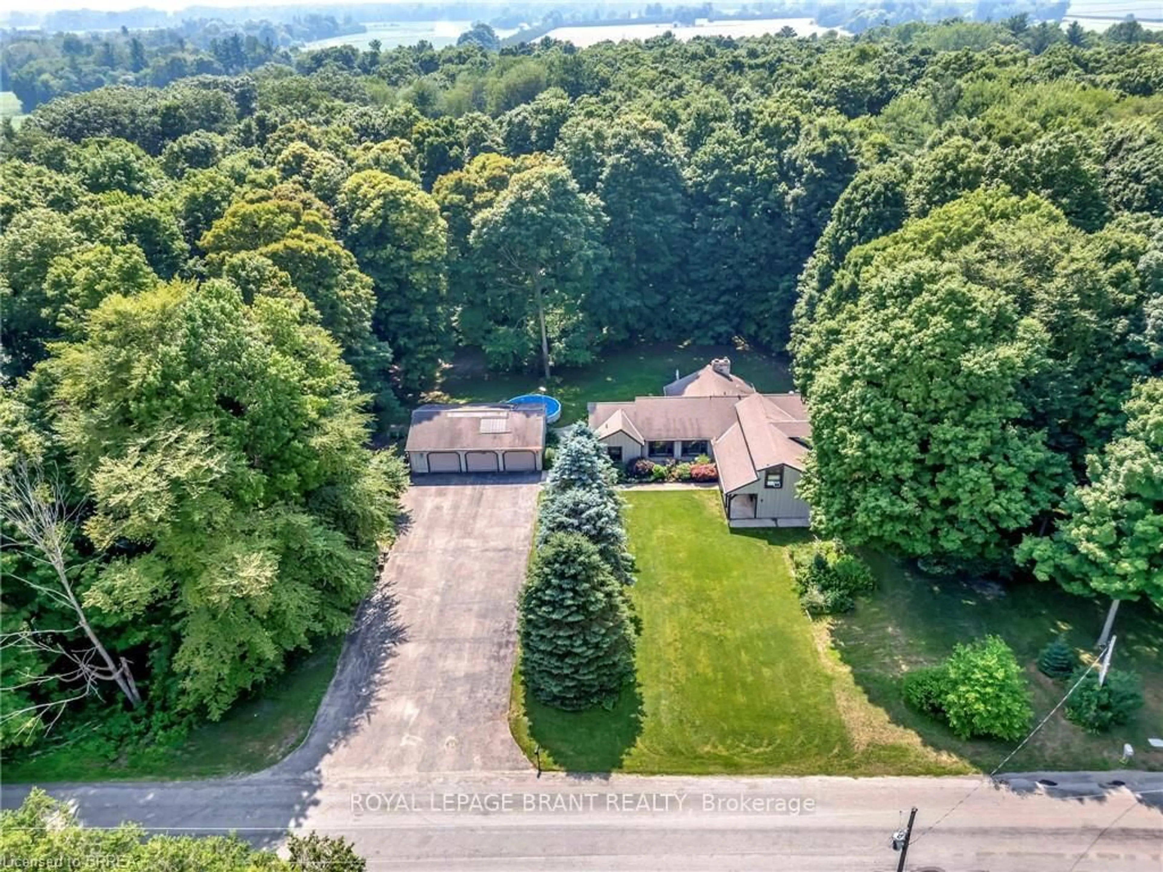 A pic from outside/outdoor area/front of a property/back of a property/a pic from drone, unknown for 2257 Swimming Pool Rd, Norwich Ontario N0E 1H0