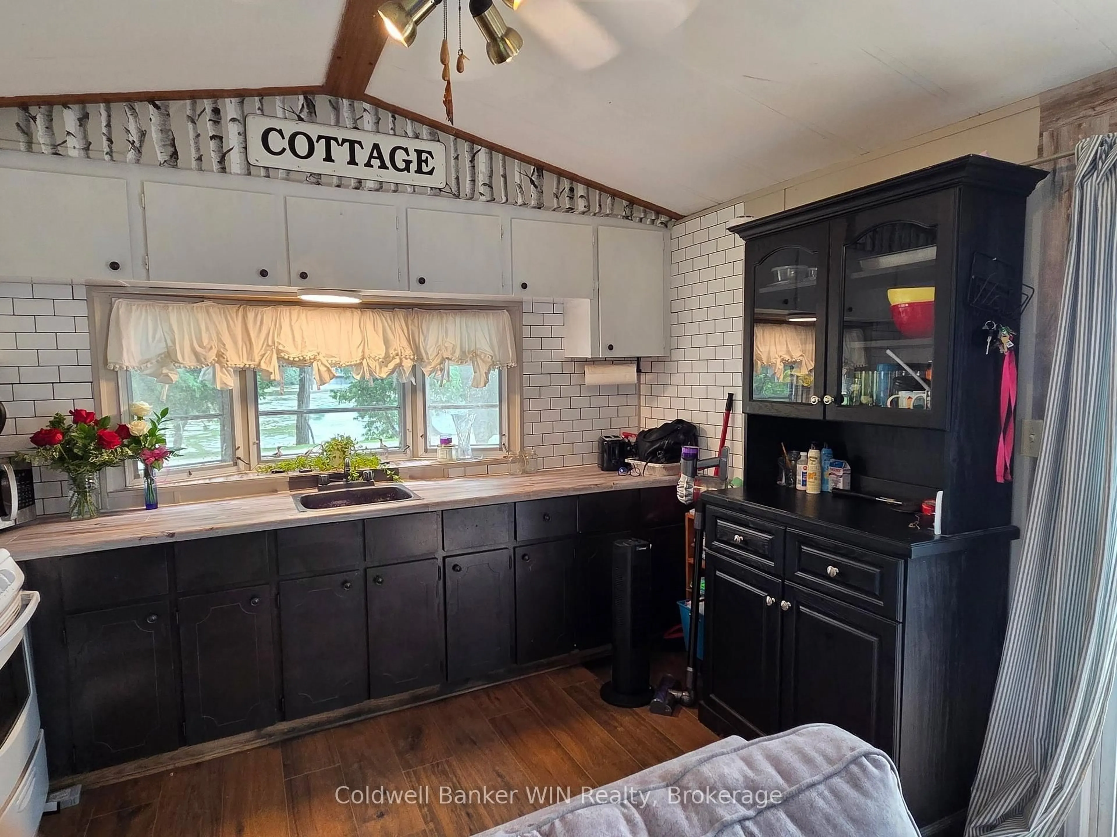 Open concept kitchen, ceramic/tile floor for 7489 SIDEROAD 5 E #E14 Edgewater, Wellington North Ontario N0G 2L0