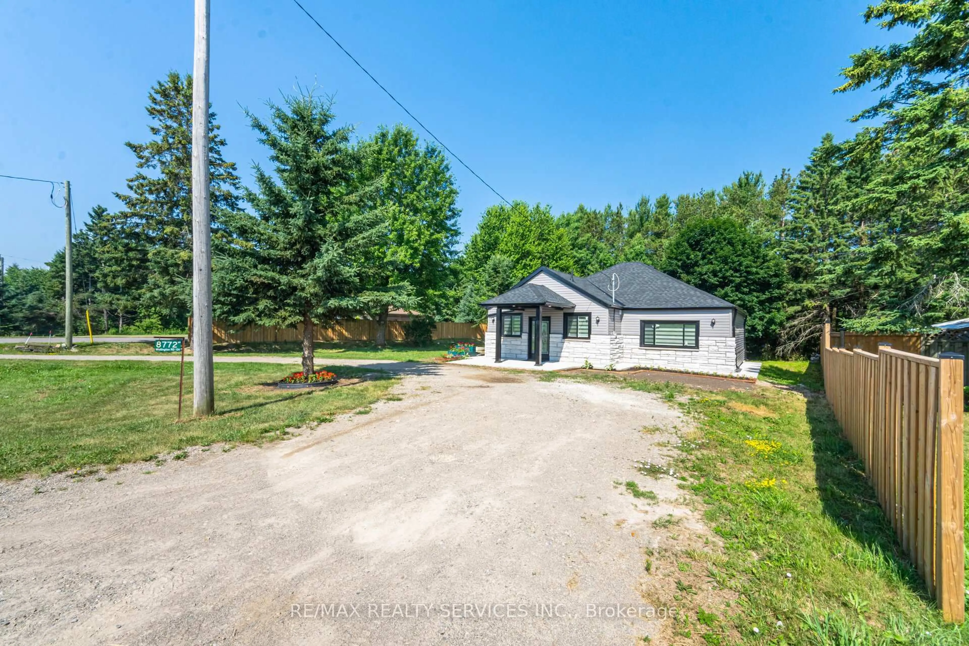 A pic from outside/outdoor area/front of a property/back of a property/a pic from drone, street for 8772 Wellington Rd #124, Erin Ontario N0B 1Z0