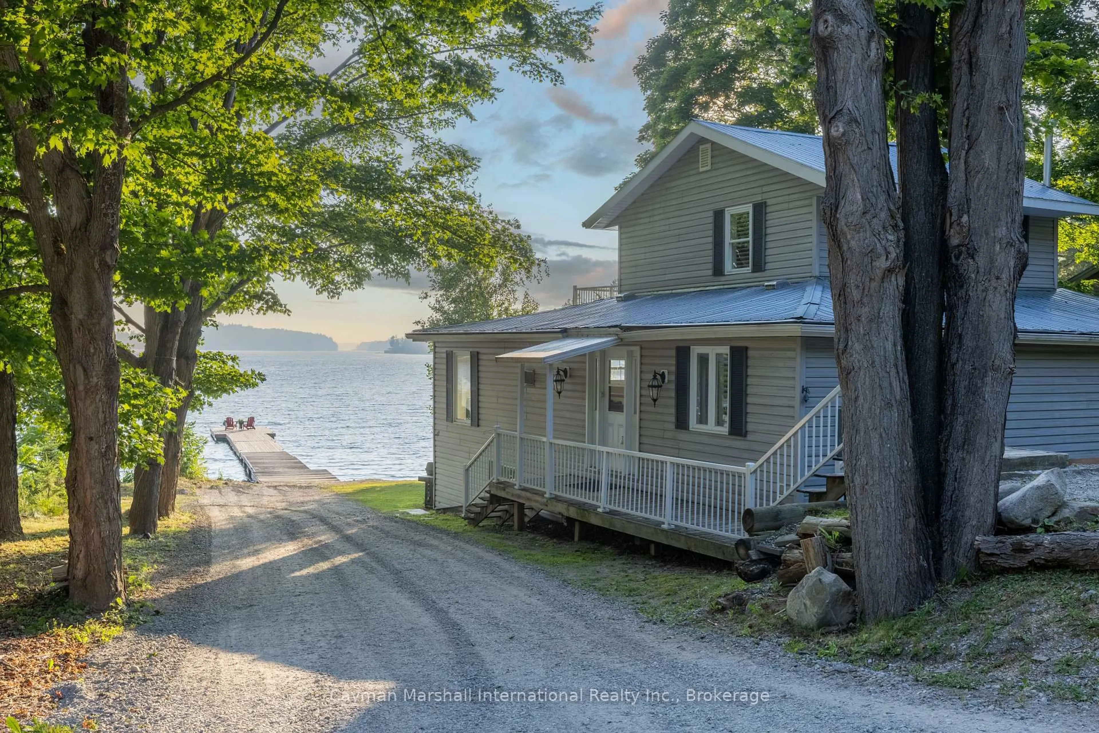 A pic from outside/outdoor area/front of a property/back of a property/a pic from drone, water/lake/river/ocean view for 1509 Muskoka Road 118 Rd, Muskoka Lakes Ontario P1L 1W8