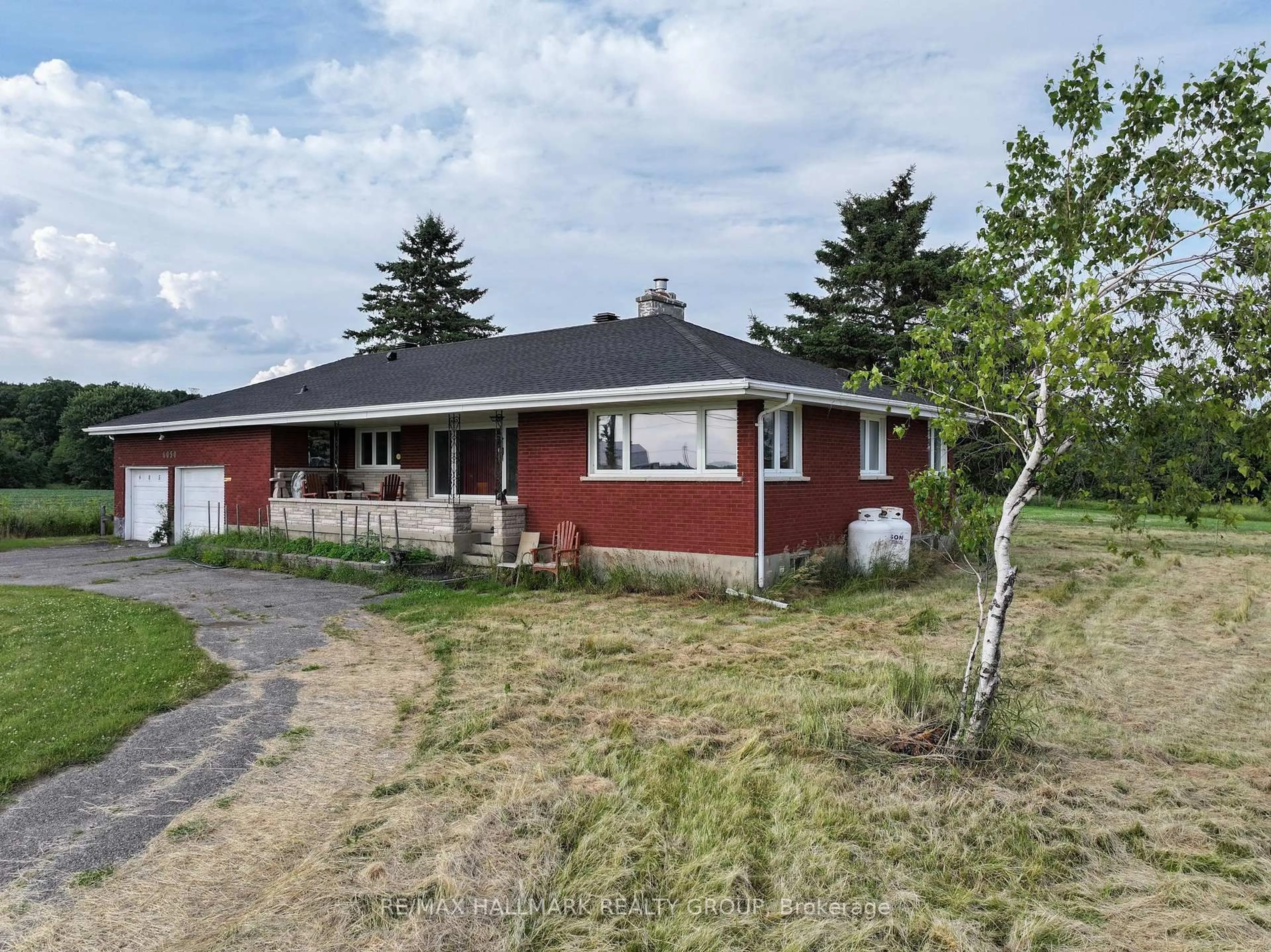 A pic from outside/outdoor area/front of a property/back of a property/a pic from drone, street for 6050 Old Richmond Rd, Richmond Ontario K0A 2Z0
