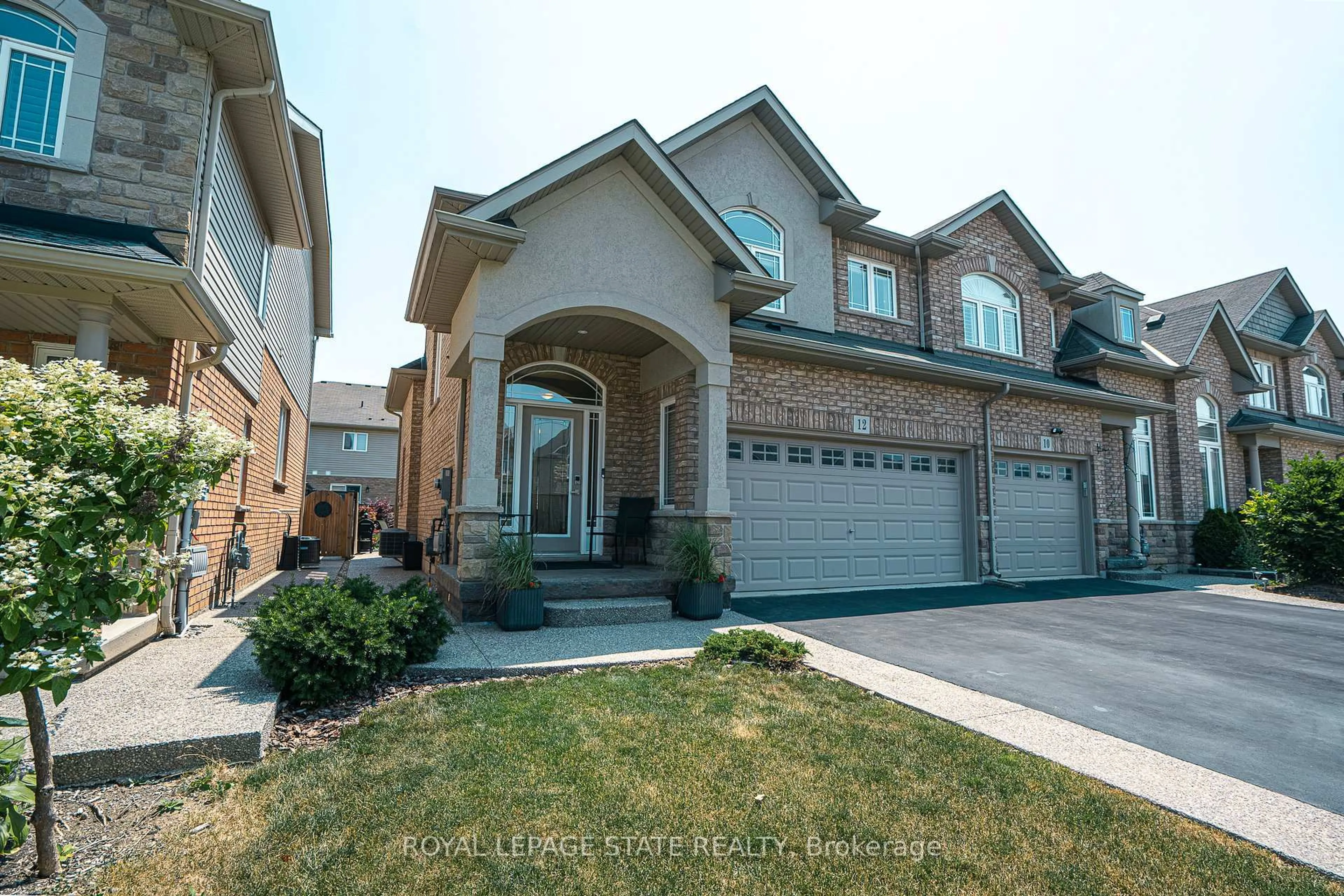 Home with brick exterior material, street for 12 Charleswood Cres, Hamilton Ontario L0R 1P0