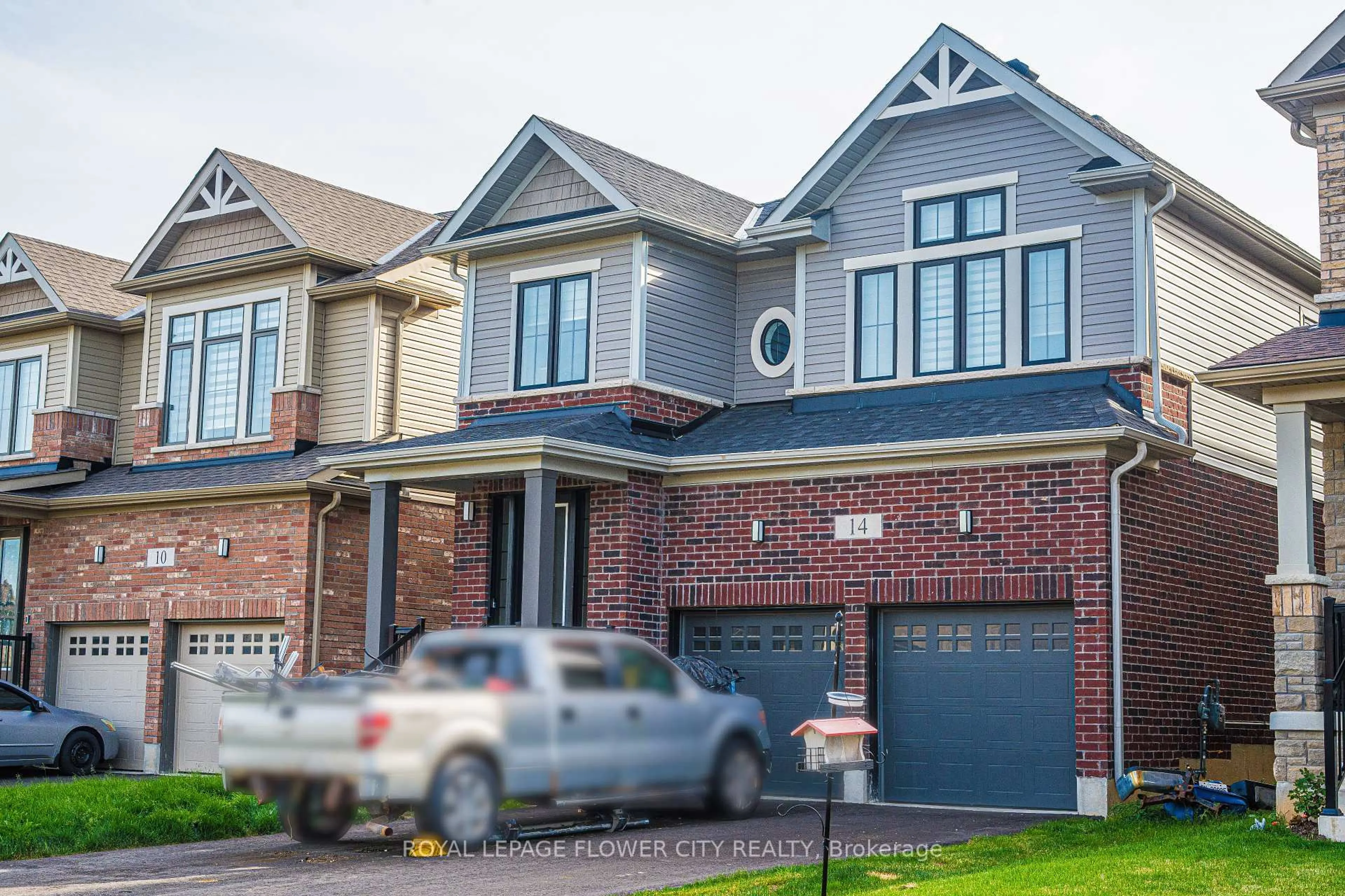 Home with brick exterior material, street for 14 Prince Phillip Dr, North Dumfries Ontario N0B 1E0