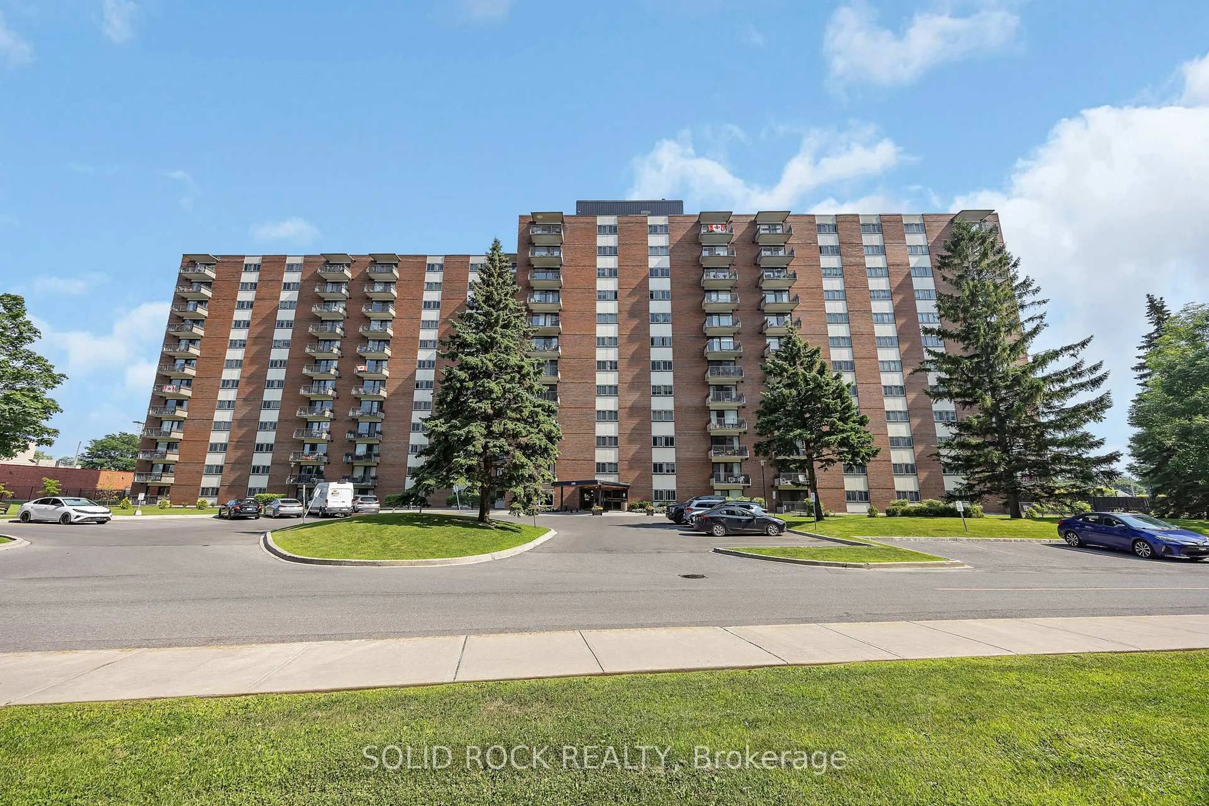 A pic from outside/outdoor area/front of a property/back of a property/a pic from drone, street for 1465 Baseline Rd, Ottawa Ontario K2C 3L9