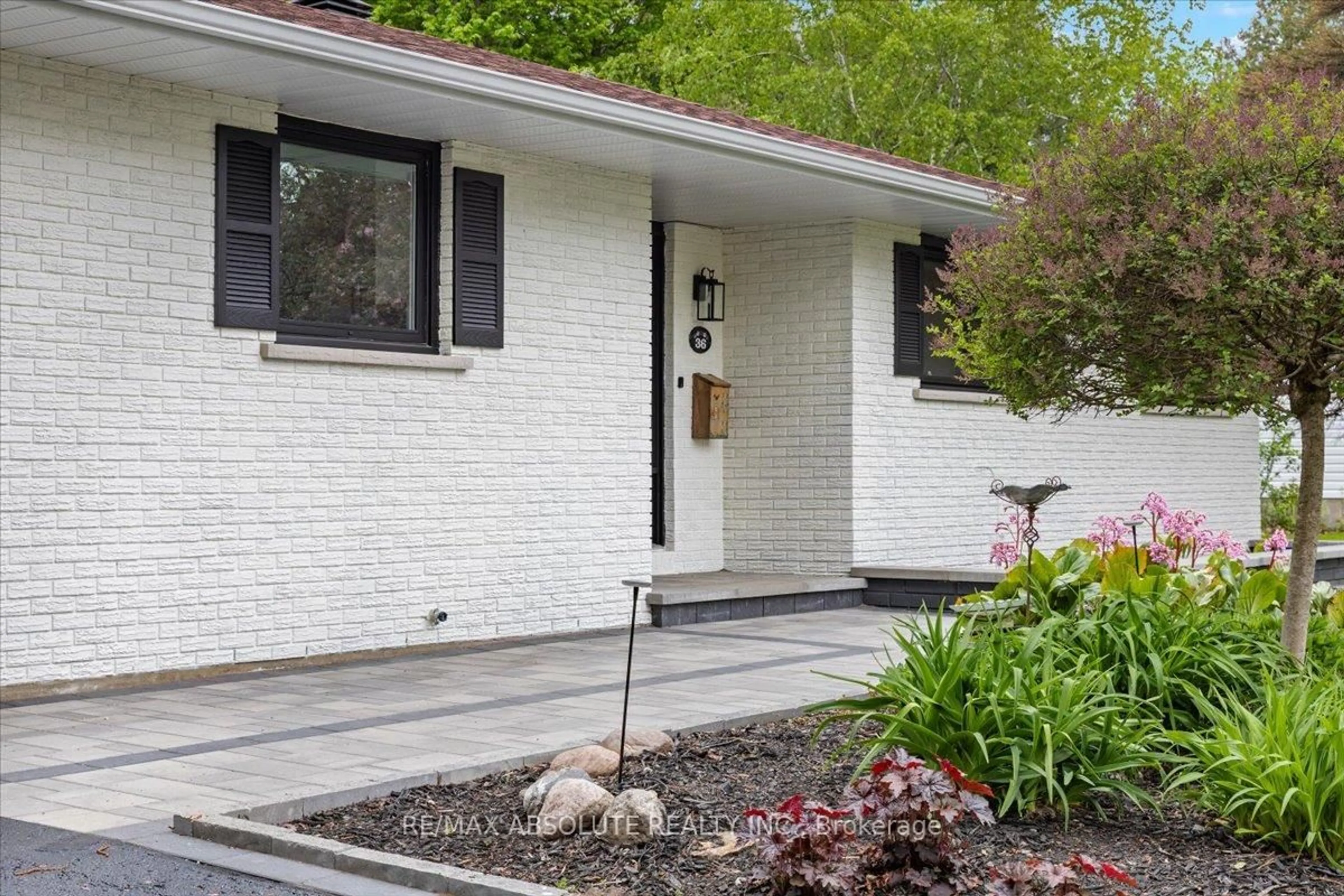 Home with vinyl exterior material, street for 36 Beverly St, Ottawa Ontario K2S 0S2