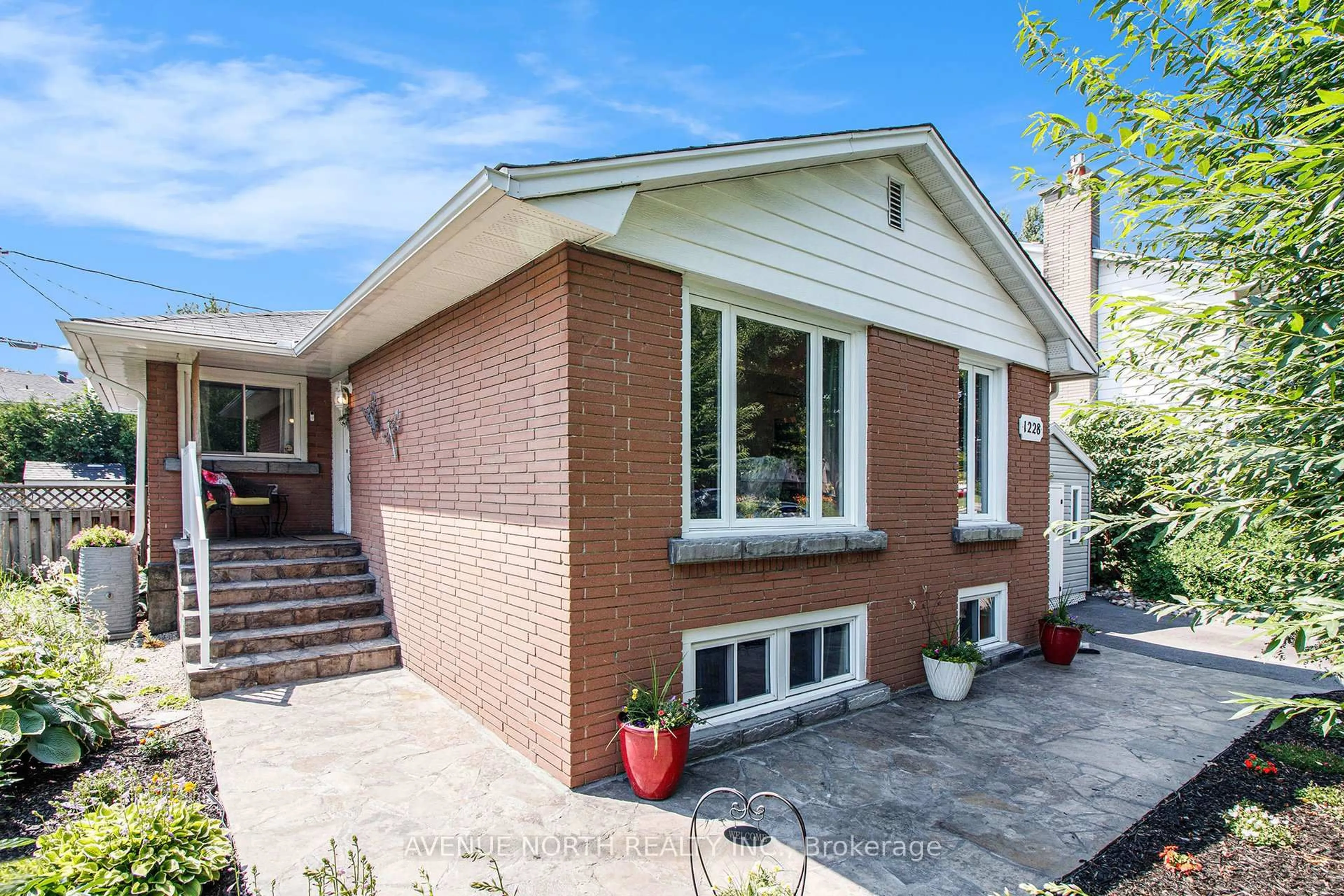 Home with brick exterior material, street for 1228 Amesbrooke Dr, Ottawa Ontario K2C 2E6
