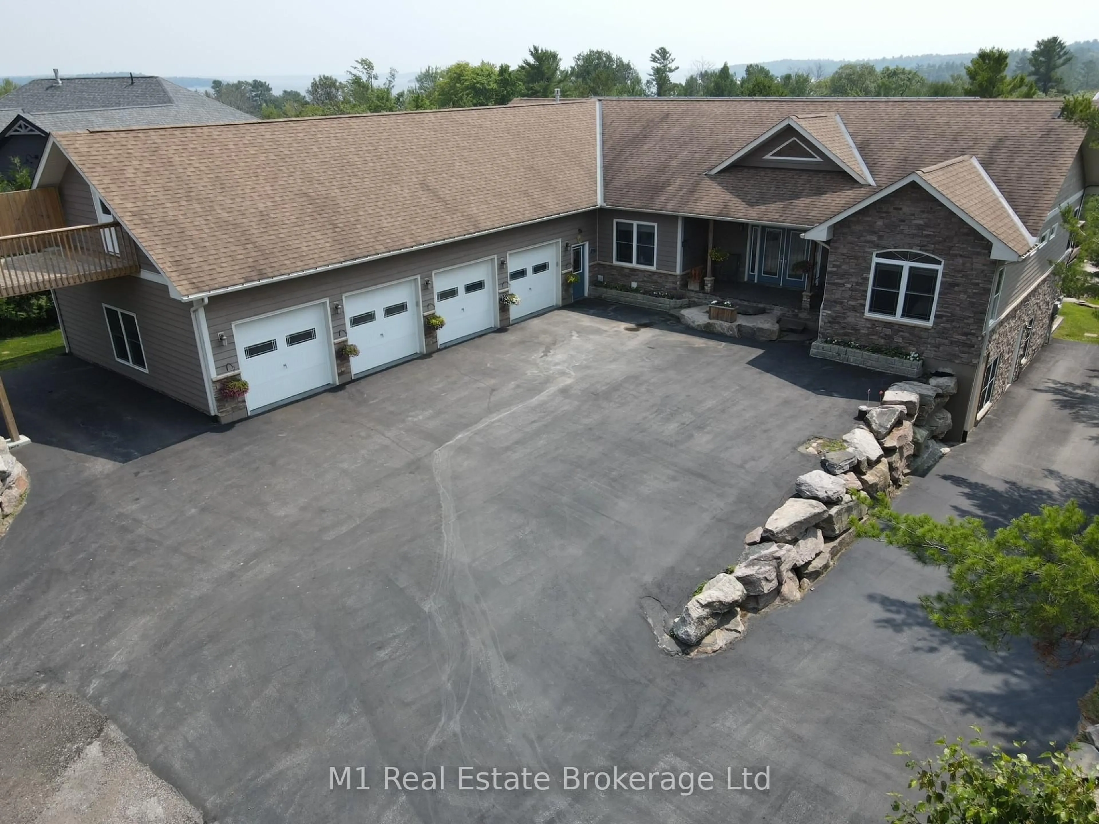 A pic from outside/outdoor area/front of a property/back of a property/a pic from drone, water/lake/river/ocean view for 65 Big Sound Rd Rd, McDougall Ontario P0G 1G0