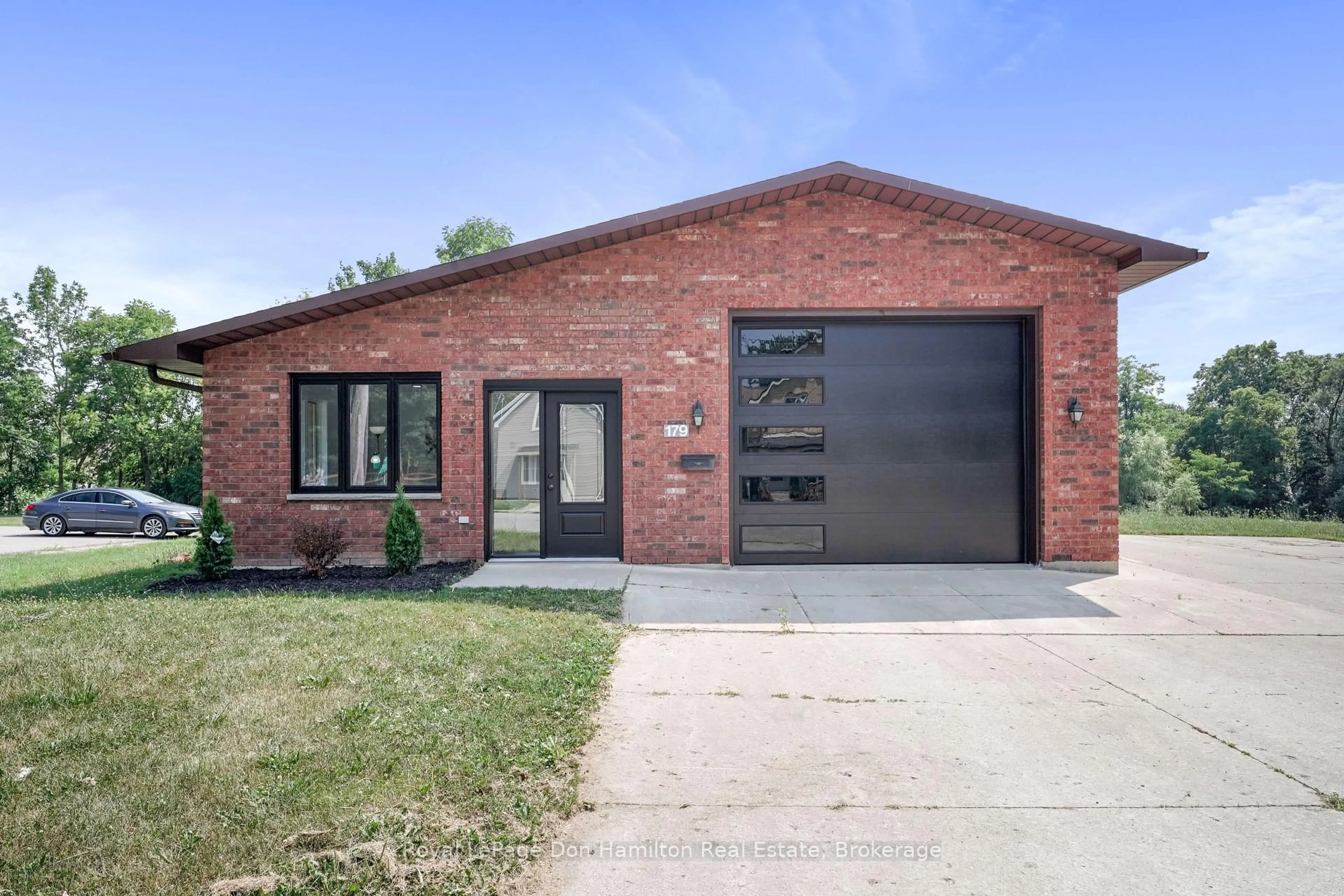 Home with brick exterior material, street for 179 Mill St, North Middlesex Ontario N0M 2K0