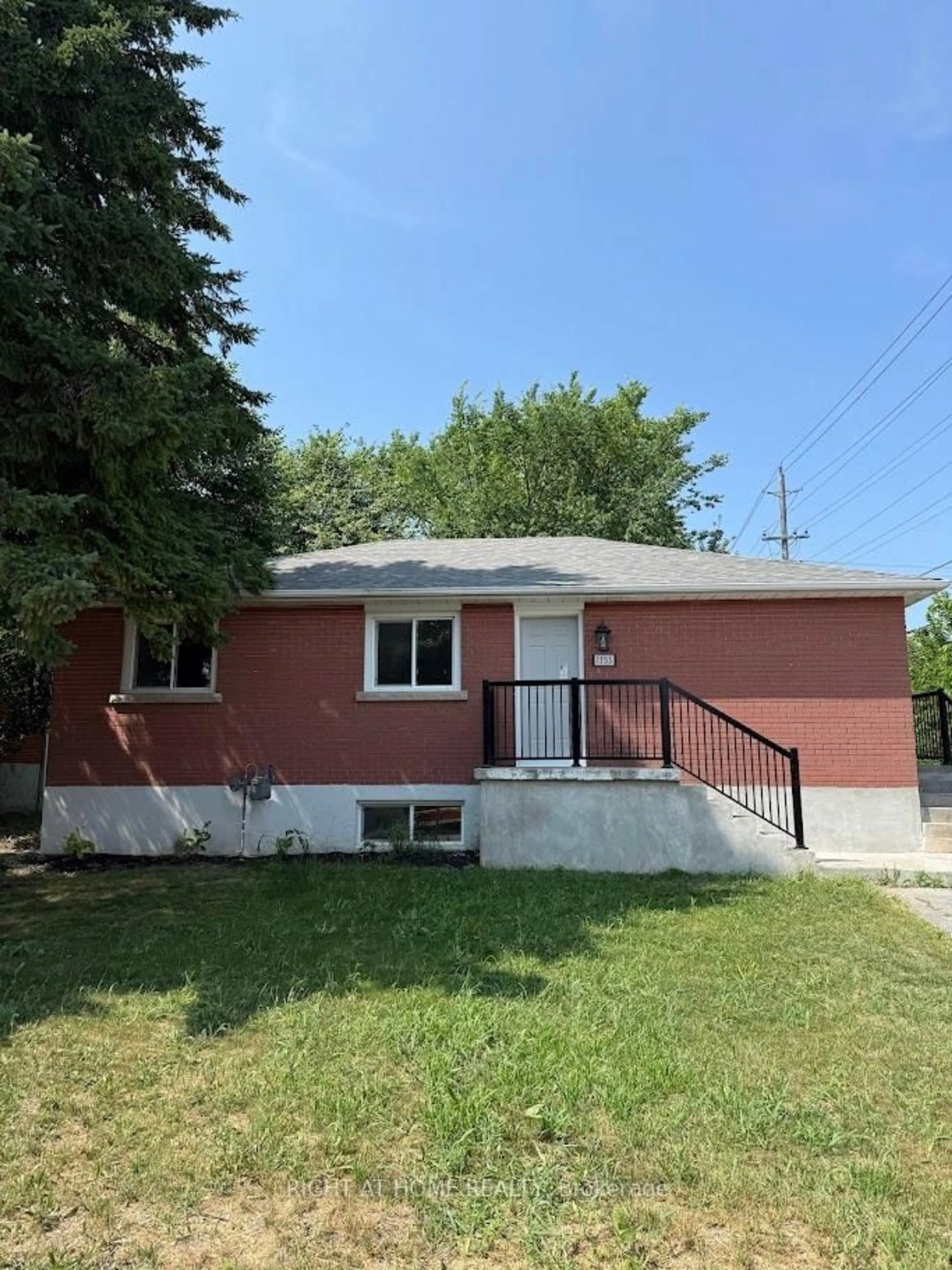 Home with vinyl exterior material, street for 1153 Johnson St, Kingston Ontario K7M 2N9