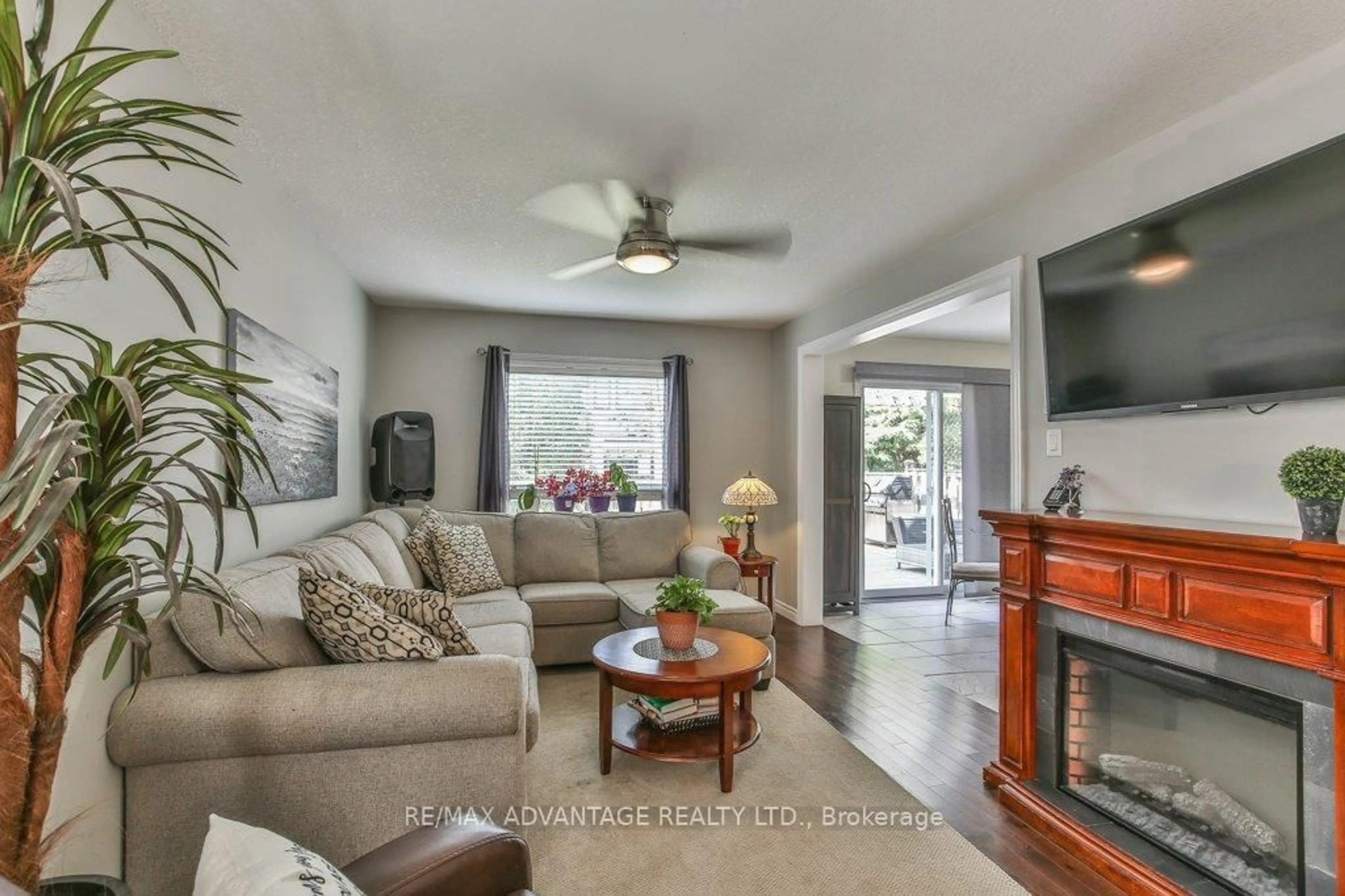 Living room with furniture, ceramic/tile floor for 2051 Foxwood Ave, London North Ontario N6G 0C6