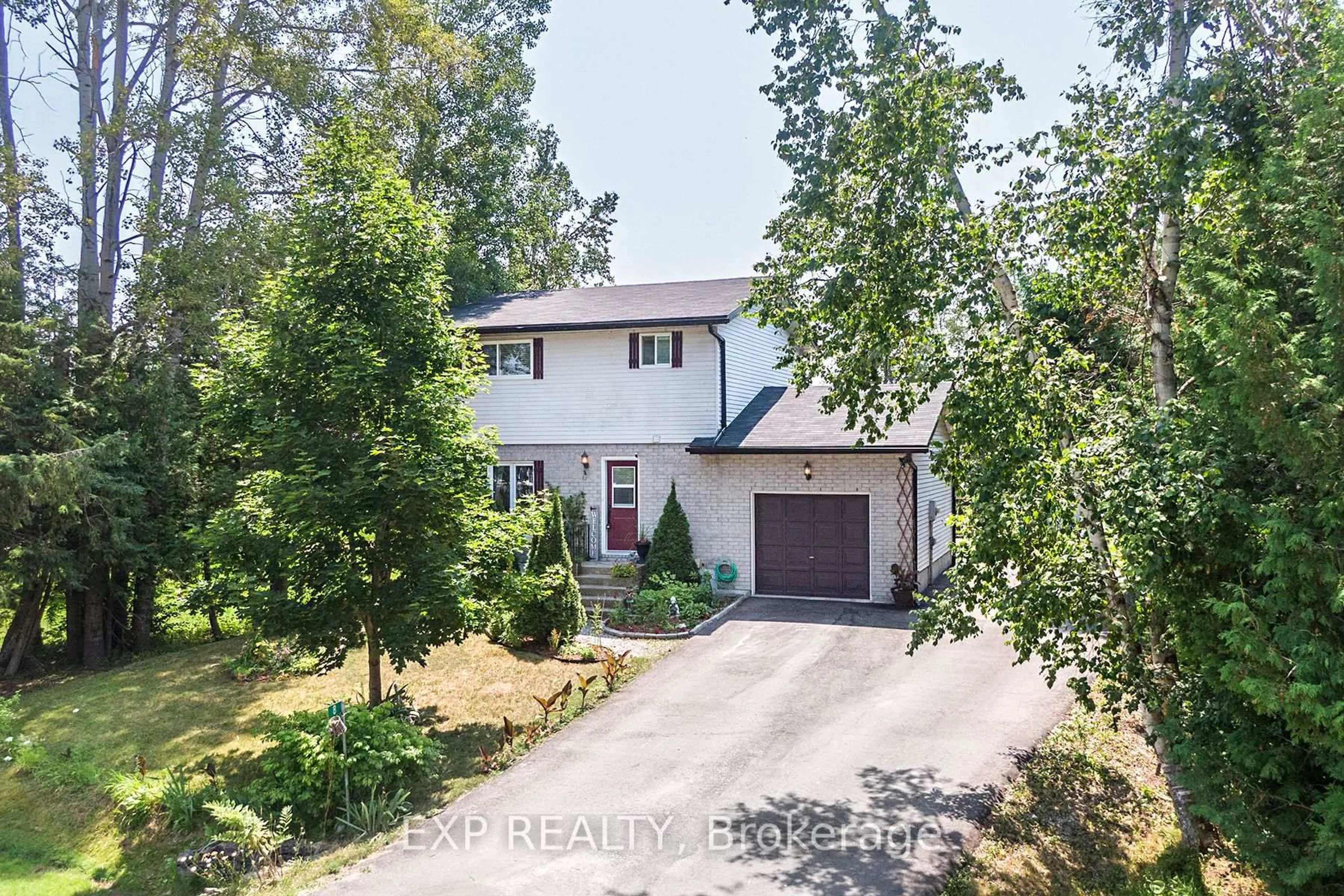 A pic from outside/outdoor area/front of a property/back of a property/a pic from drone, street for 8 Pinewood Blvd, Kawartha Lakes Ontario K0M 2T0