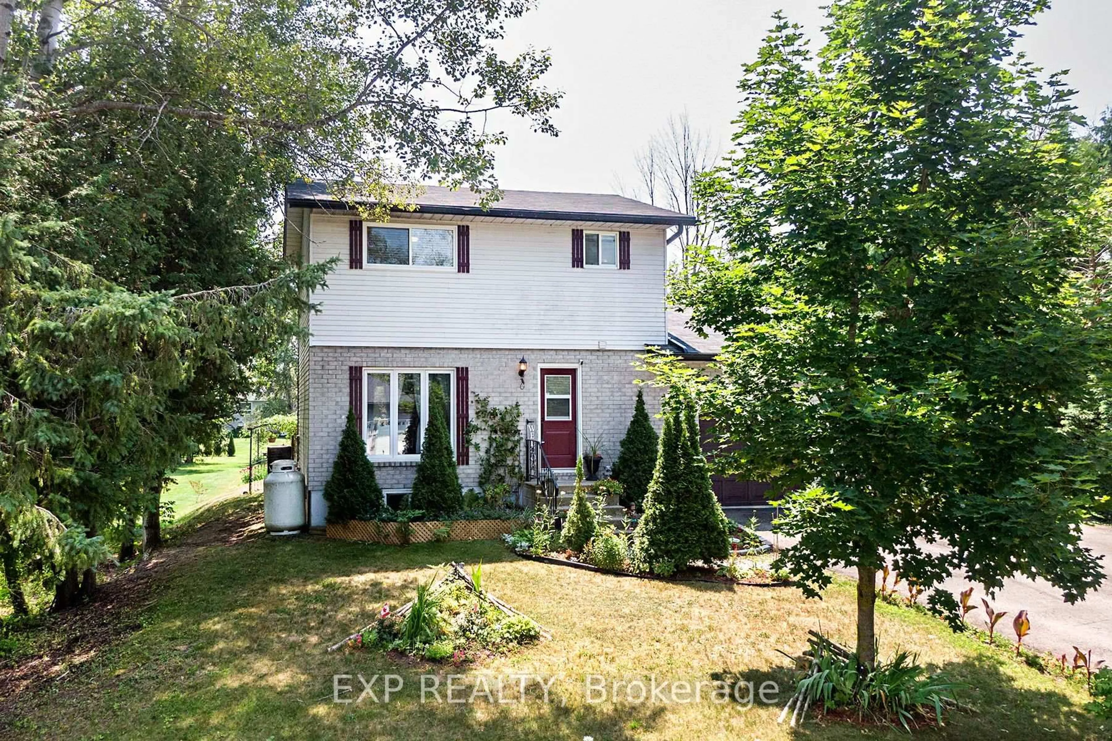 A pic from outside/outdoor area/front of a property/back of a property/a pic from drone, street for 8 Pinewood Blvd, Kawartha Lakes Ontario K0M 2T0