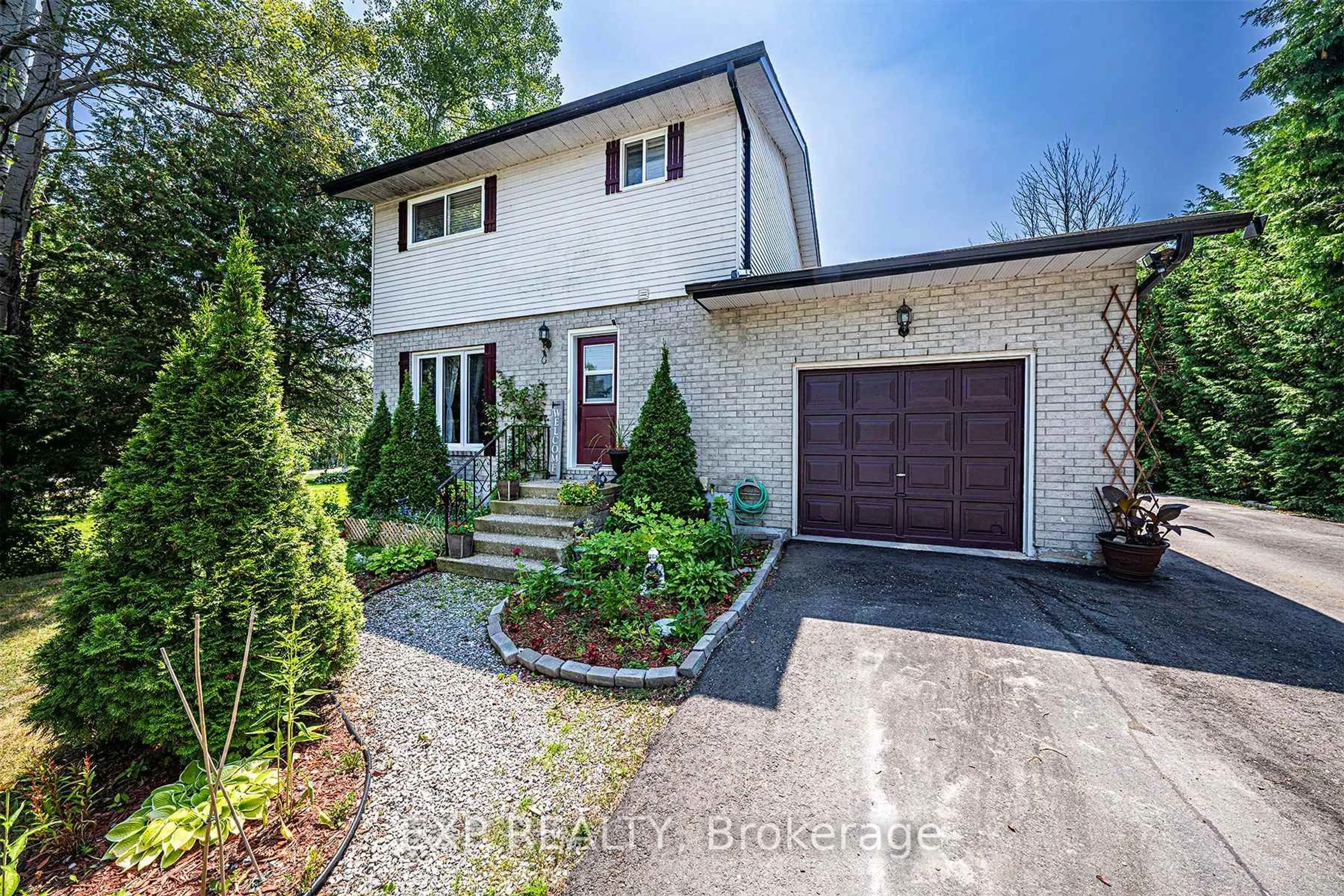 Home with brick exterior material, street for 8 Pinewood Blvd, Kawartha Lakes Ontario K0M 2T0