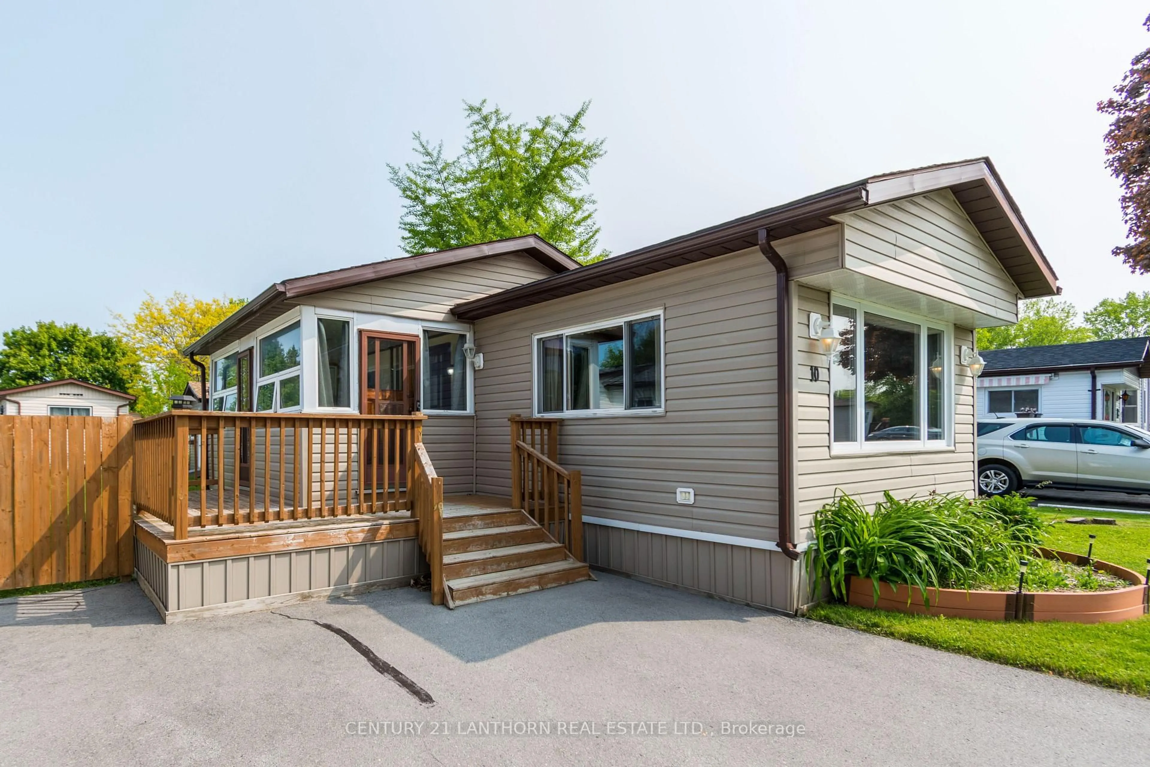Home with vinyl exterior material, street for 10 Partridge Lane, Quinte West Ontario K8N 4Z3