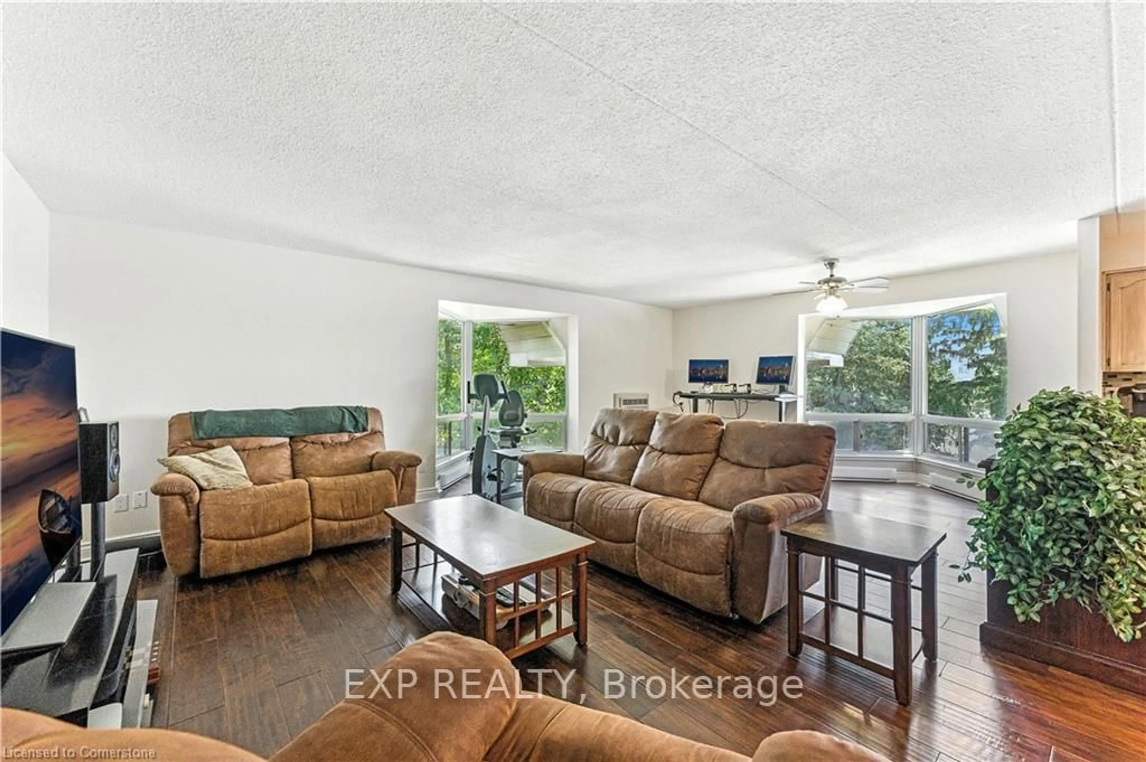 Living room with furniture, unknown for 384 Erb St #404, Waterloo Ontario N2L 1W6