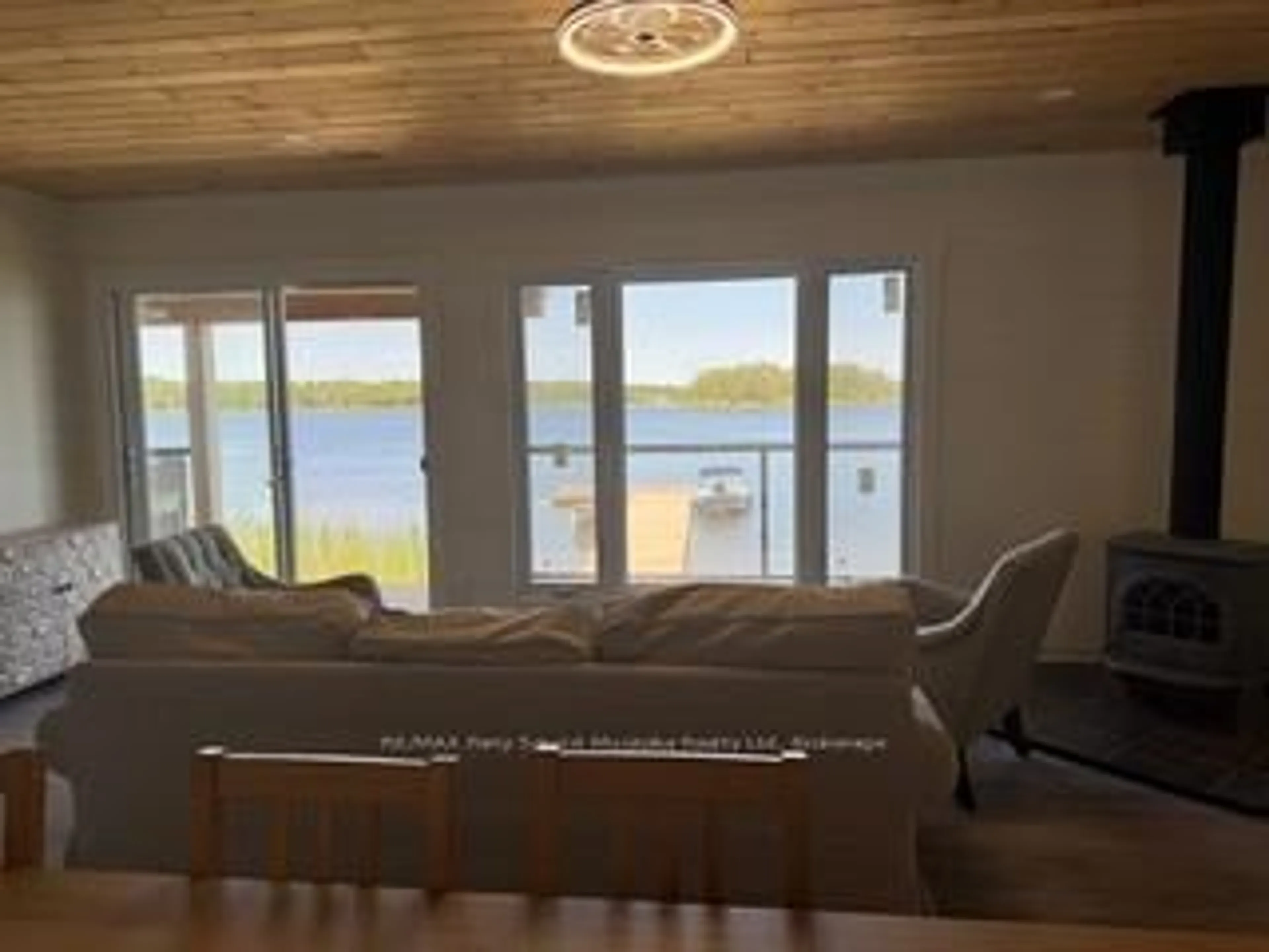 Living room with furniture, unknown for 1370 Georgian Bay Water, The Archipelago Ontario P0G 1K0