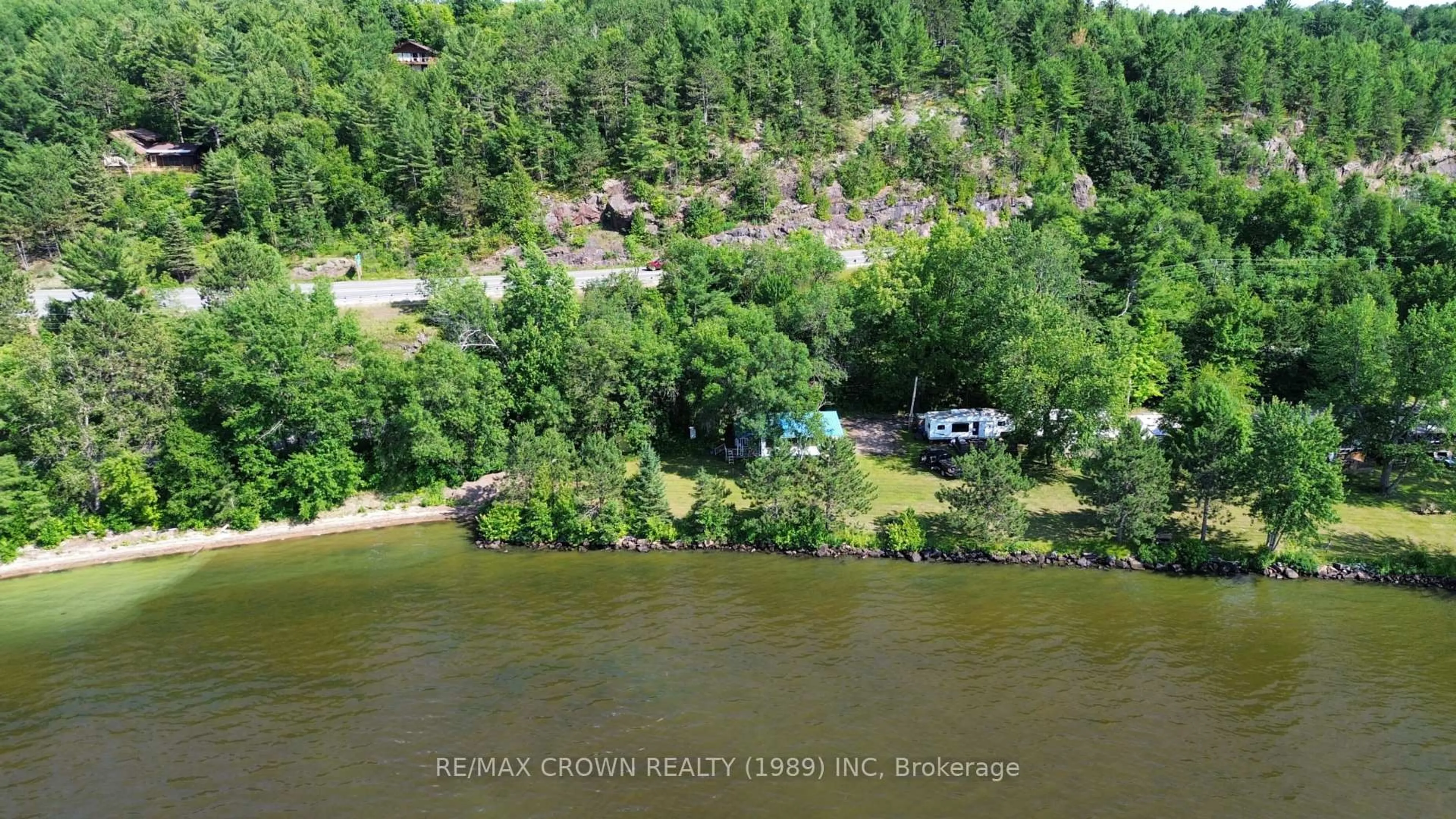 A pic from outside/outdoor area/front of a property/back of a property/a pic from drone, water/lake/river/ocean view for 80 Green Rd #13, Callander Ontario P0H 1H0