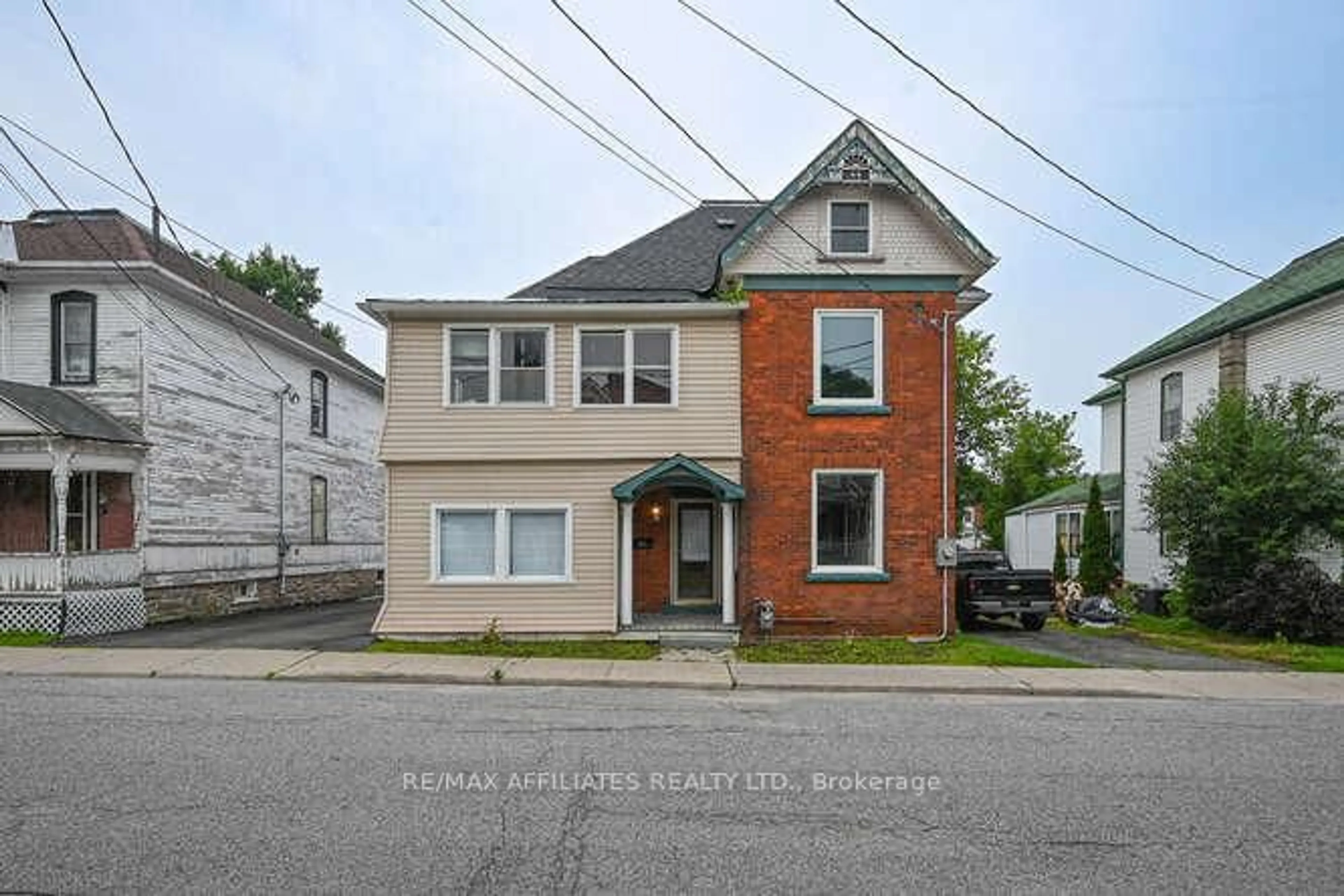 Home with brick exterior material, street for 28 Kensington Ave, Smiths Falls Ontario K7A 2K5