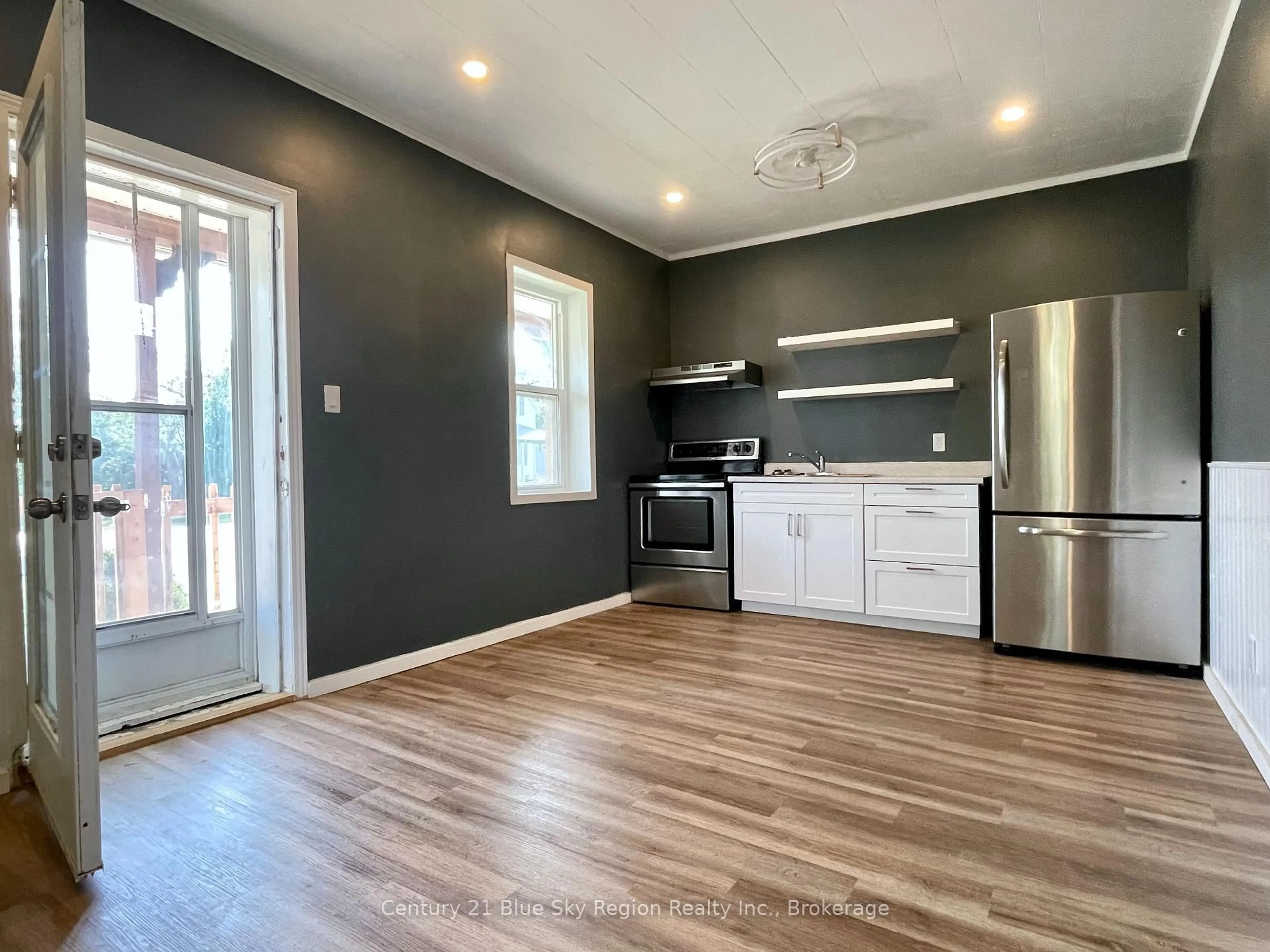 Open concept kitchen, wood/laminate floor for 39 Principale St, West Nipissing Ontario P0H 2M0