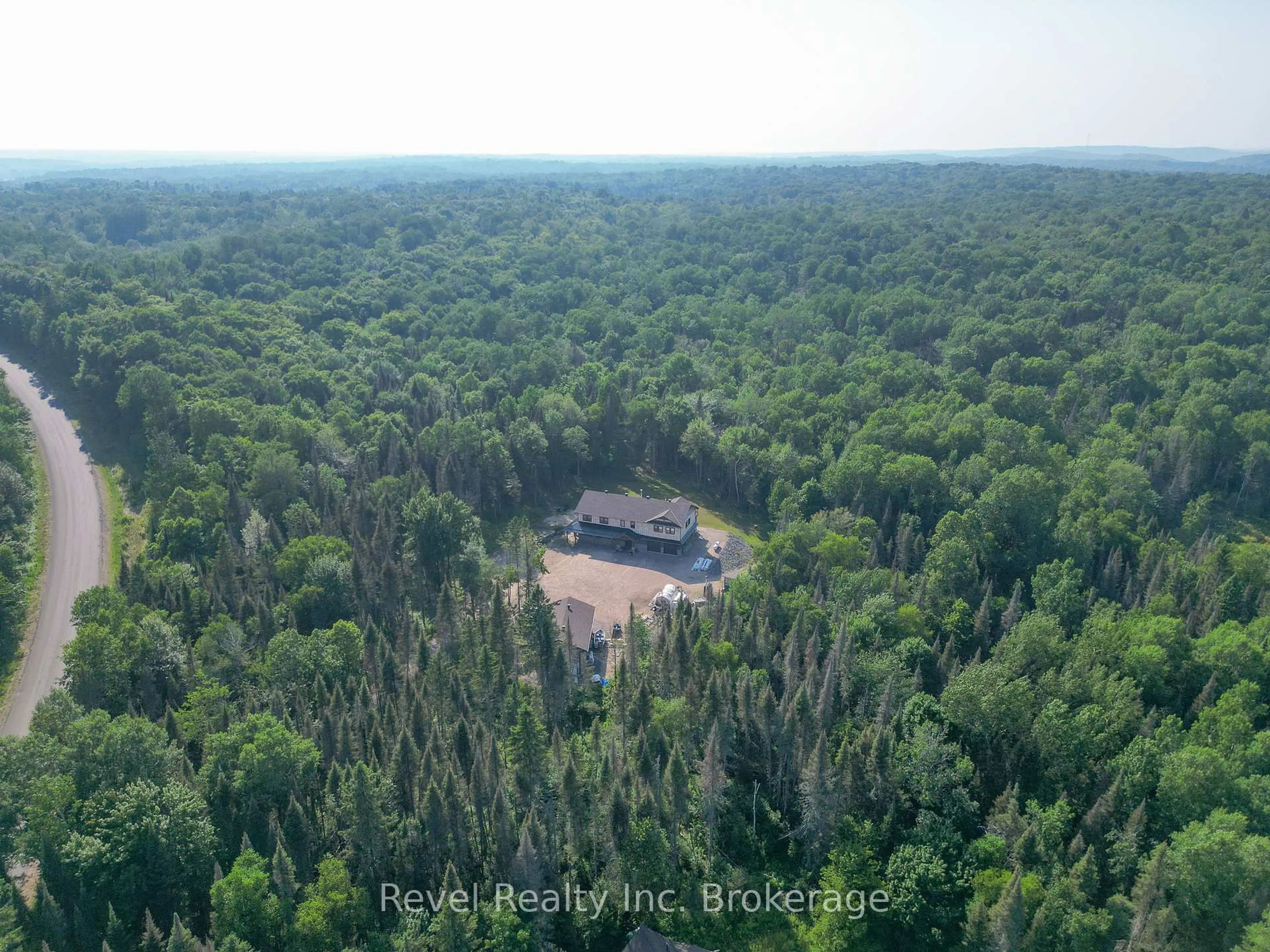 A pic from outside/outdoor area/front of a property/back of a property/a pic from drone, forest/trees view for 1196 River Rd, Chisholm Ontario P0H 1B0