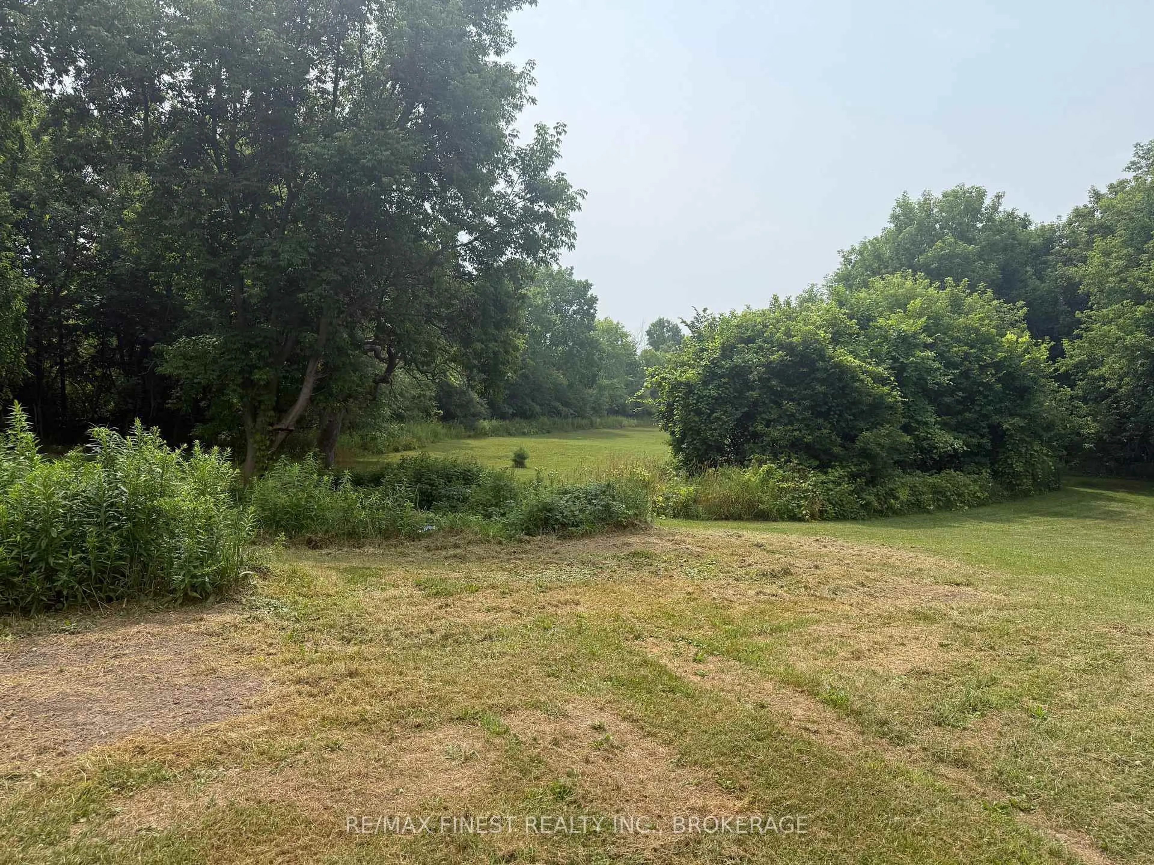 A pic from outside/outdoor area/front of a property/back of a property/a pic from drone, forest/trees view for 2712 Quabbin Rd, Bissett Creek Ontario K0H 2H0
